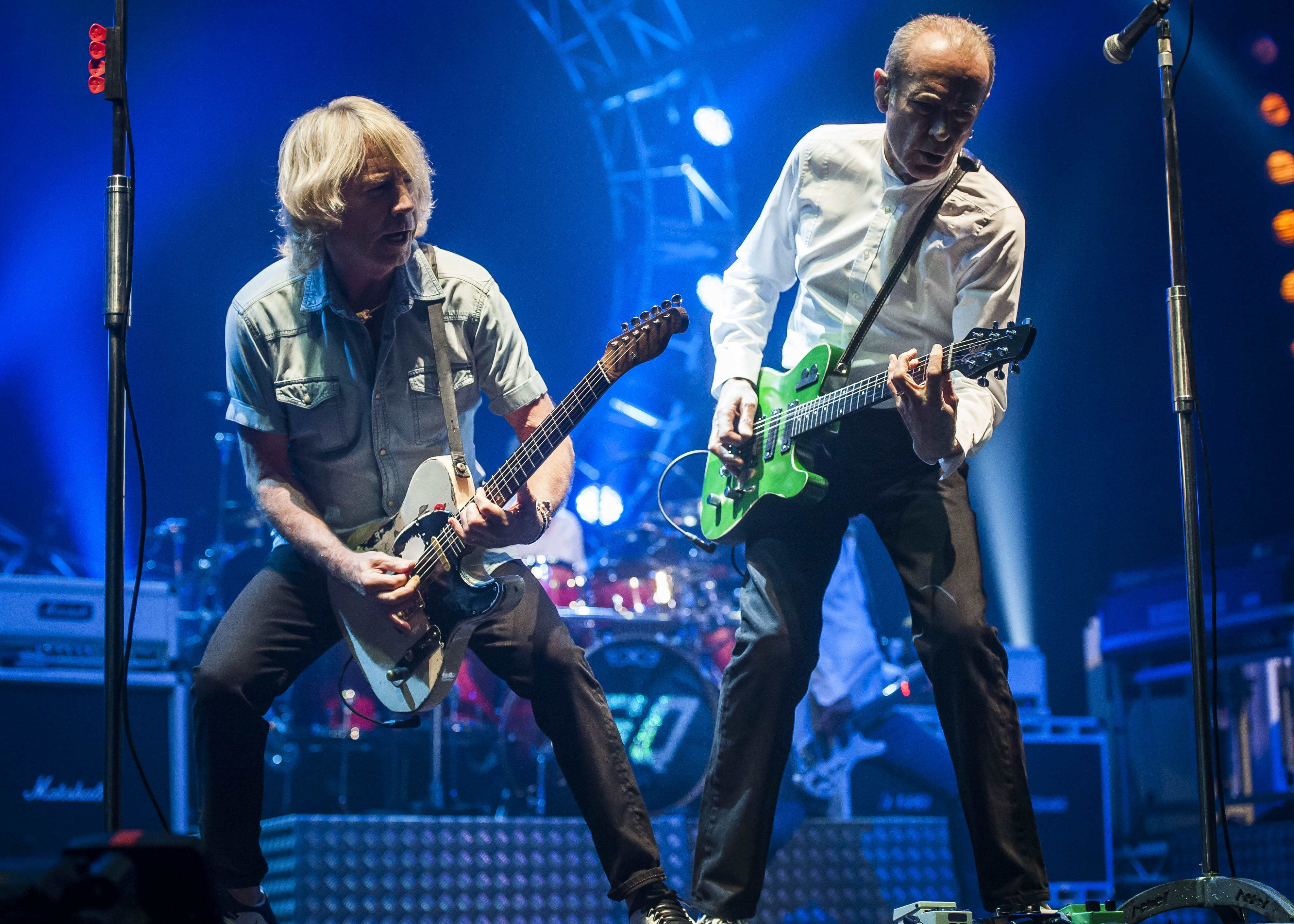 Parfitt and Rossi on stage together in 2016