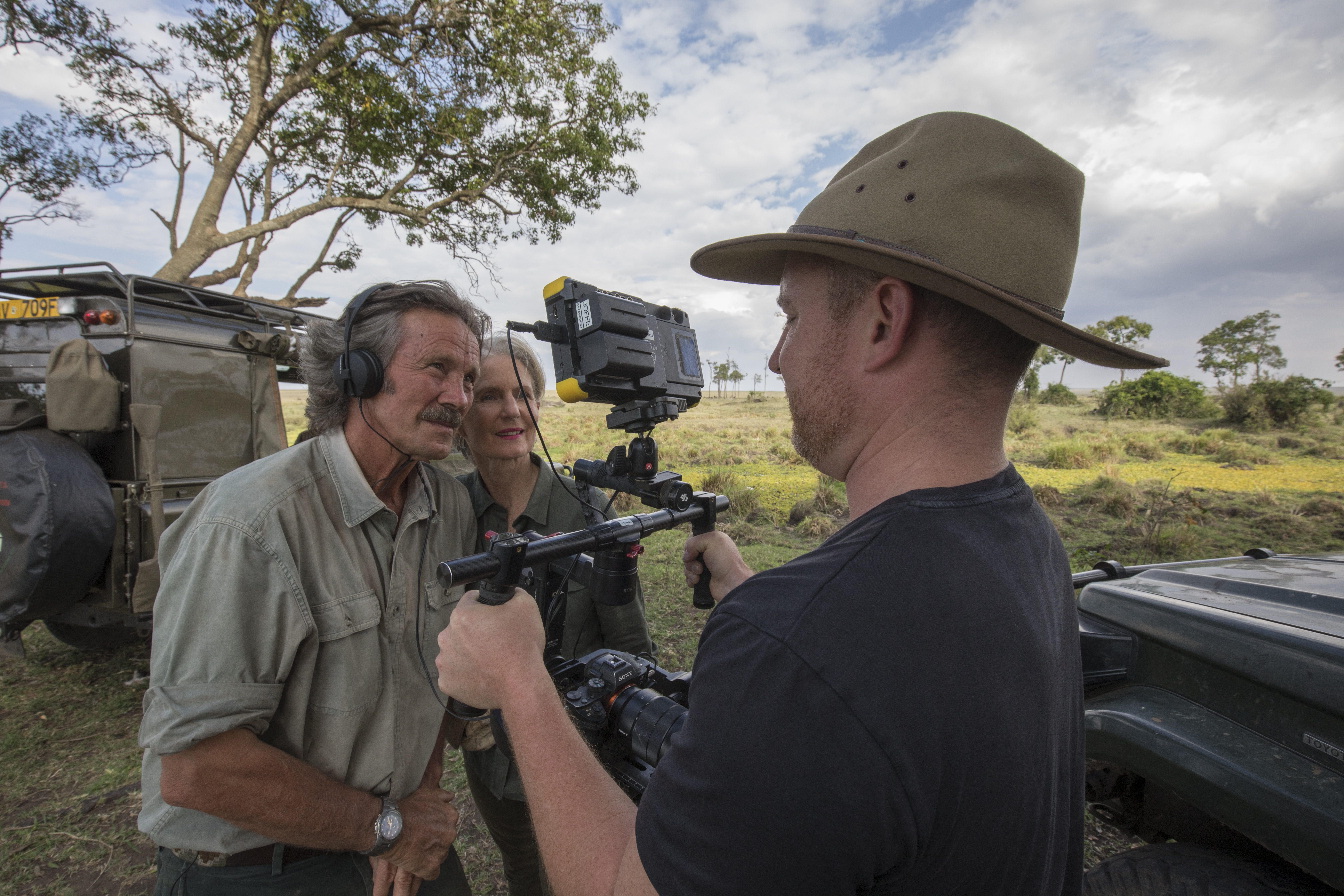 The director showing Jonathan and Angela some footage (Animal Planet/PA)