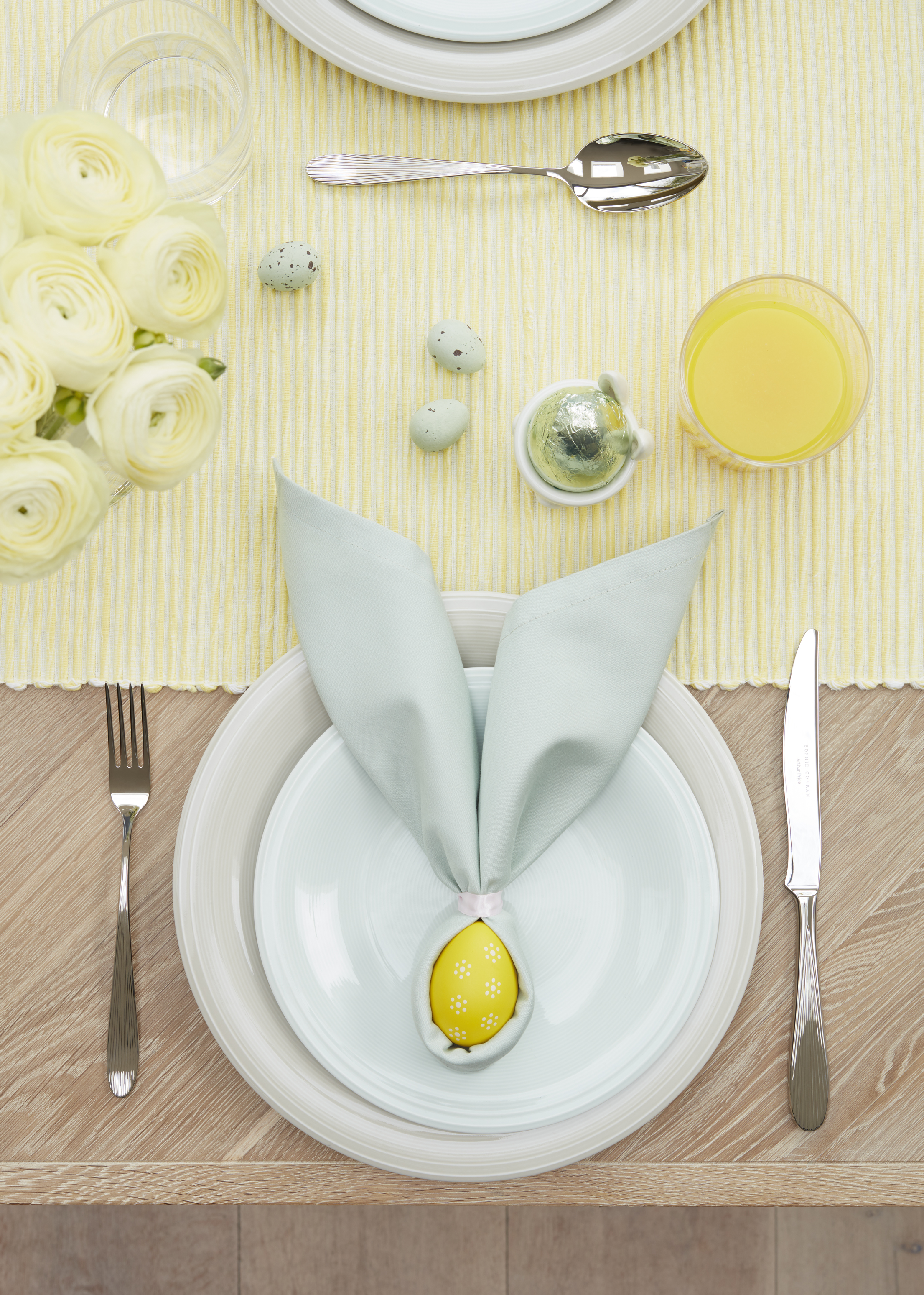 Sophie Conran for Arthur Price Rivelin Place Setting, 7 Piece, £32.50; John Lewis Mezzo Napkins, Set of Four, Lichen, £12; Rhythm Dessert Plate, 21.5cm, Blue, £5; Rhythm Dinner Plate, 28cm, Neutral, £6; Sherbet Yellow Runner, £12; Spotty Egg Cup, £4, all available John Lewis (John Lewis/PA)