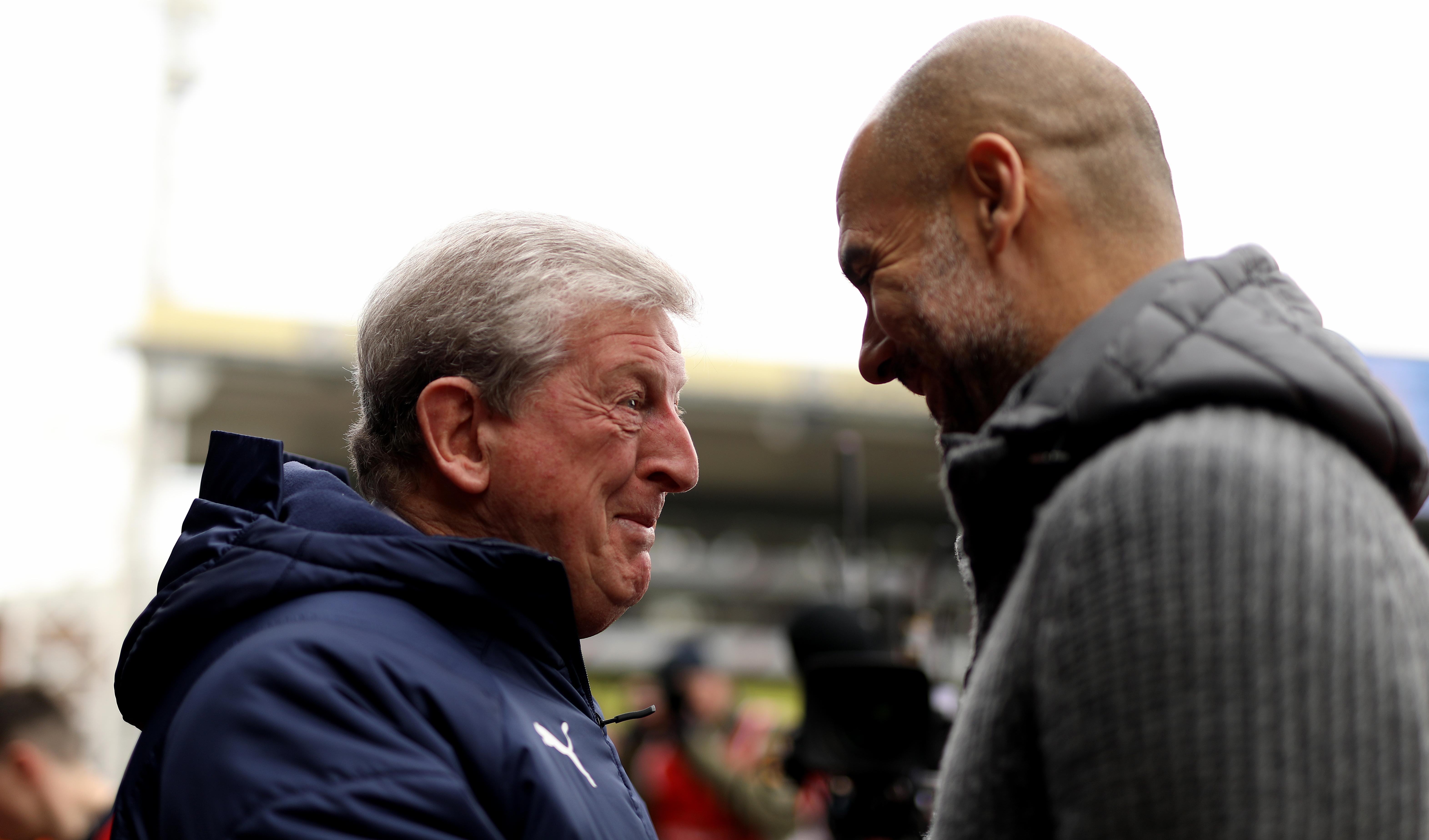 Crystal Palace manager Roy Hodgson (left) and Manchester City manager Pep Guardiola (right) before kick-off during a Premier League match at Selhurst Park, London