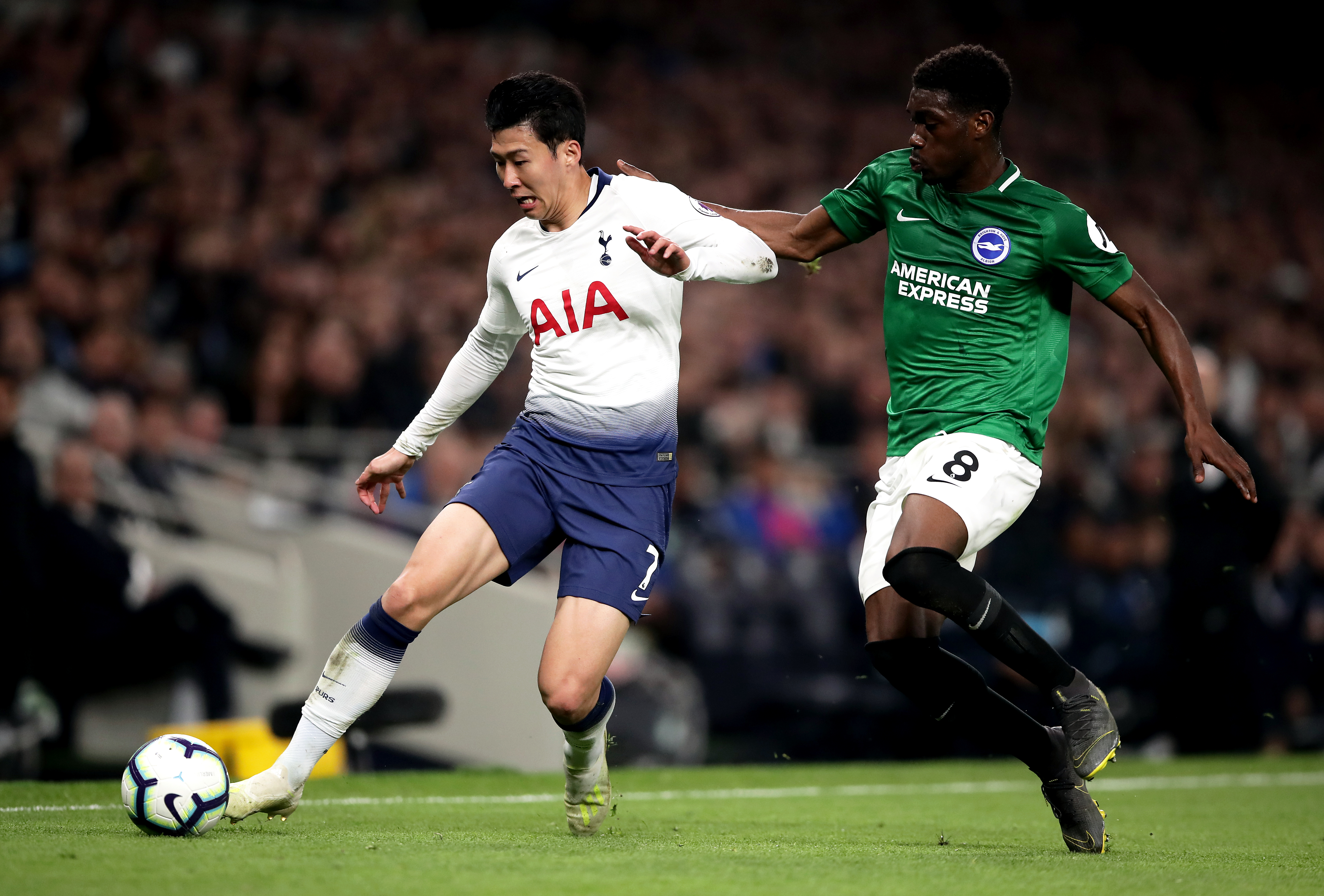 Son Heung-min plays for Tottenham during a Premier League match against Brighton