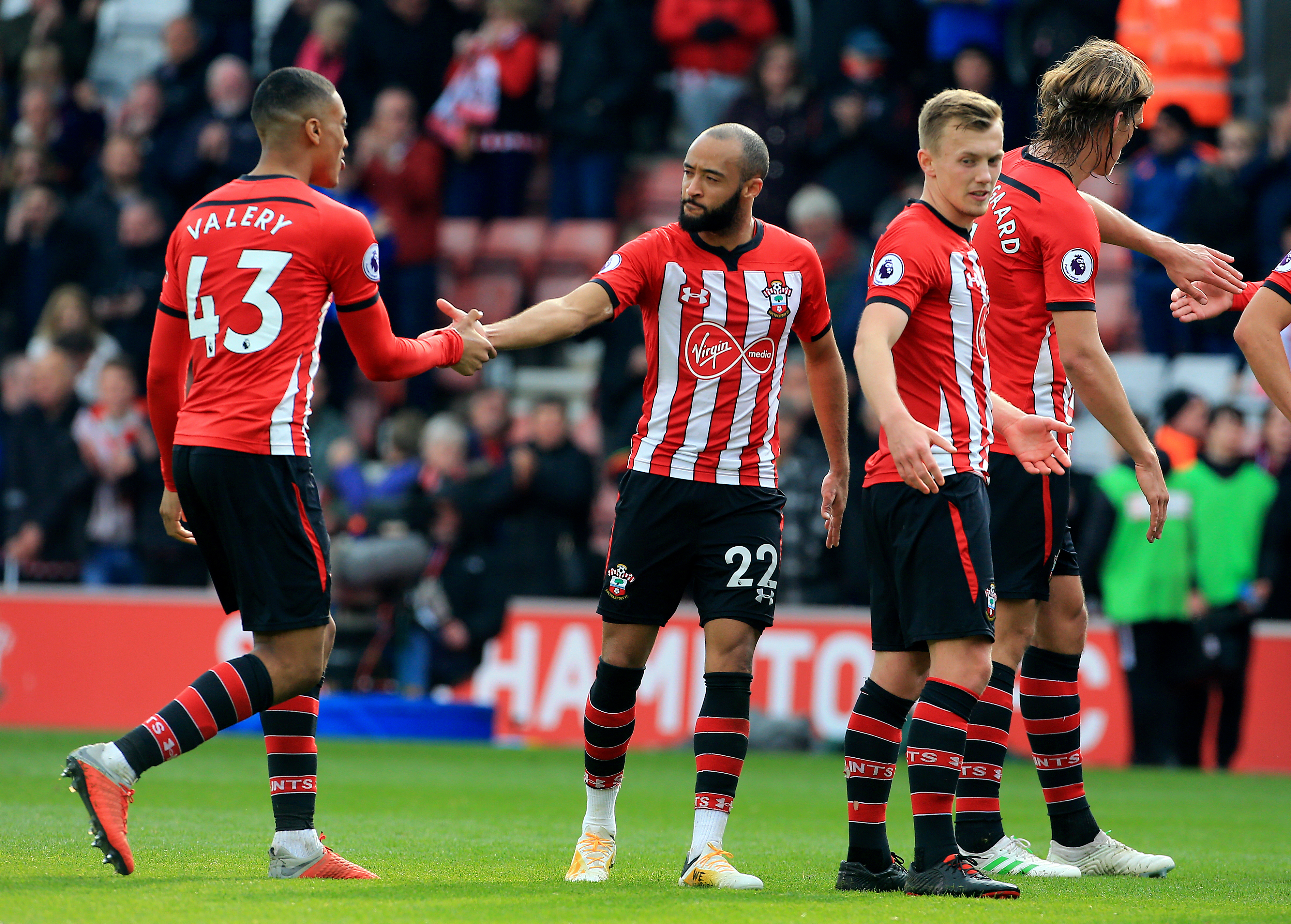 Southampton's Yan Valery (left) and Southampton's Nathan Redmond (22) after the final whistle during a Premier League match