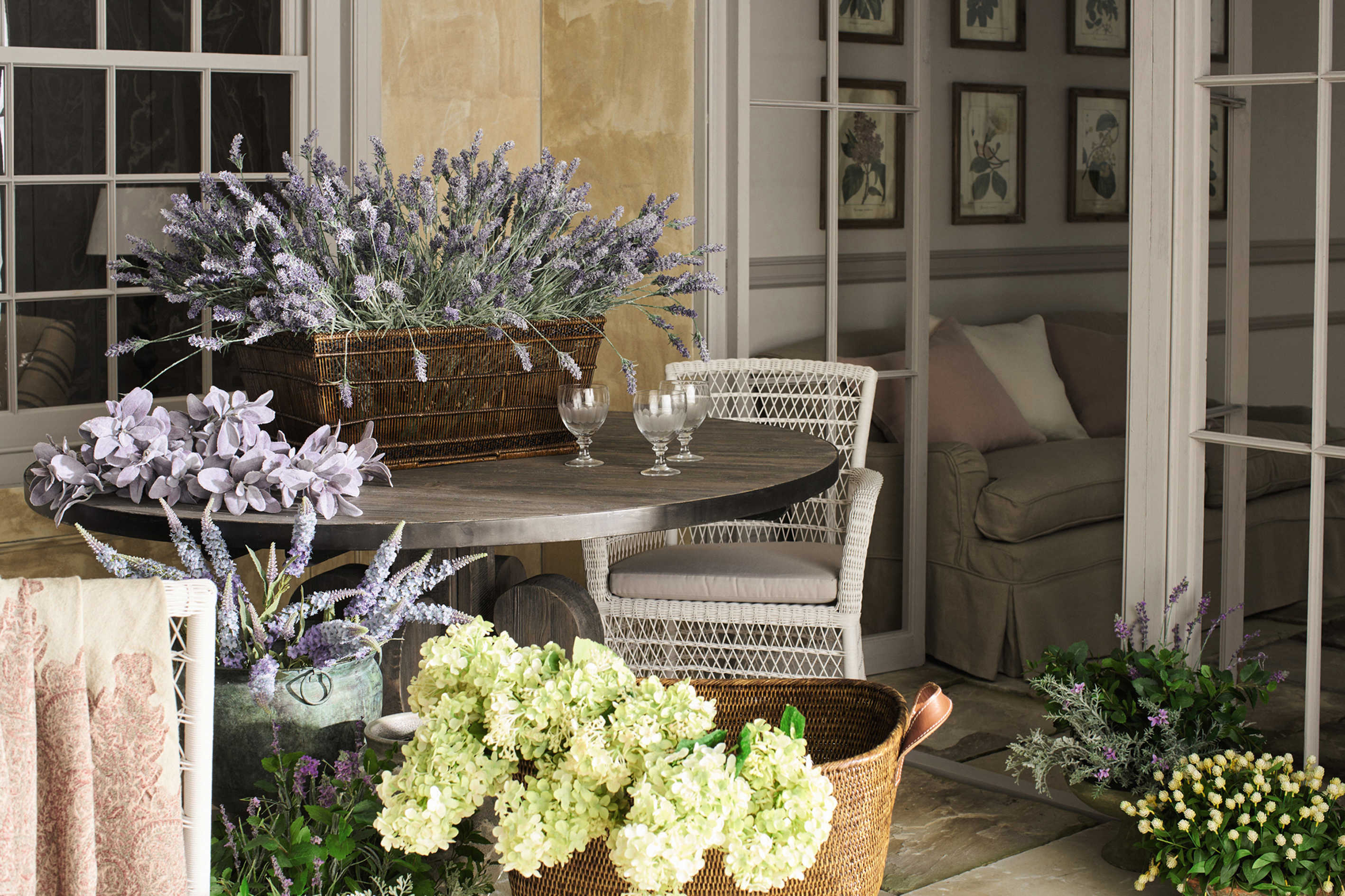 Faux lilac stems, faux hydrangea panicula stems and faux clover plants, from £6 per stem, from a selection at OKA (OKA/PA)