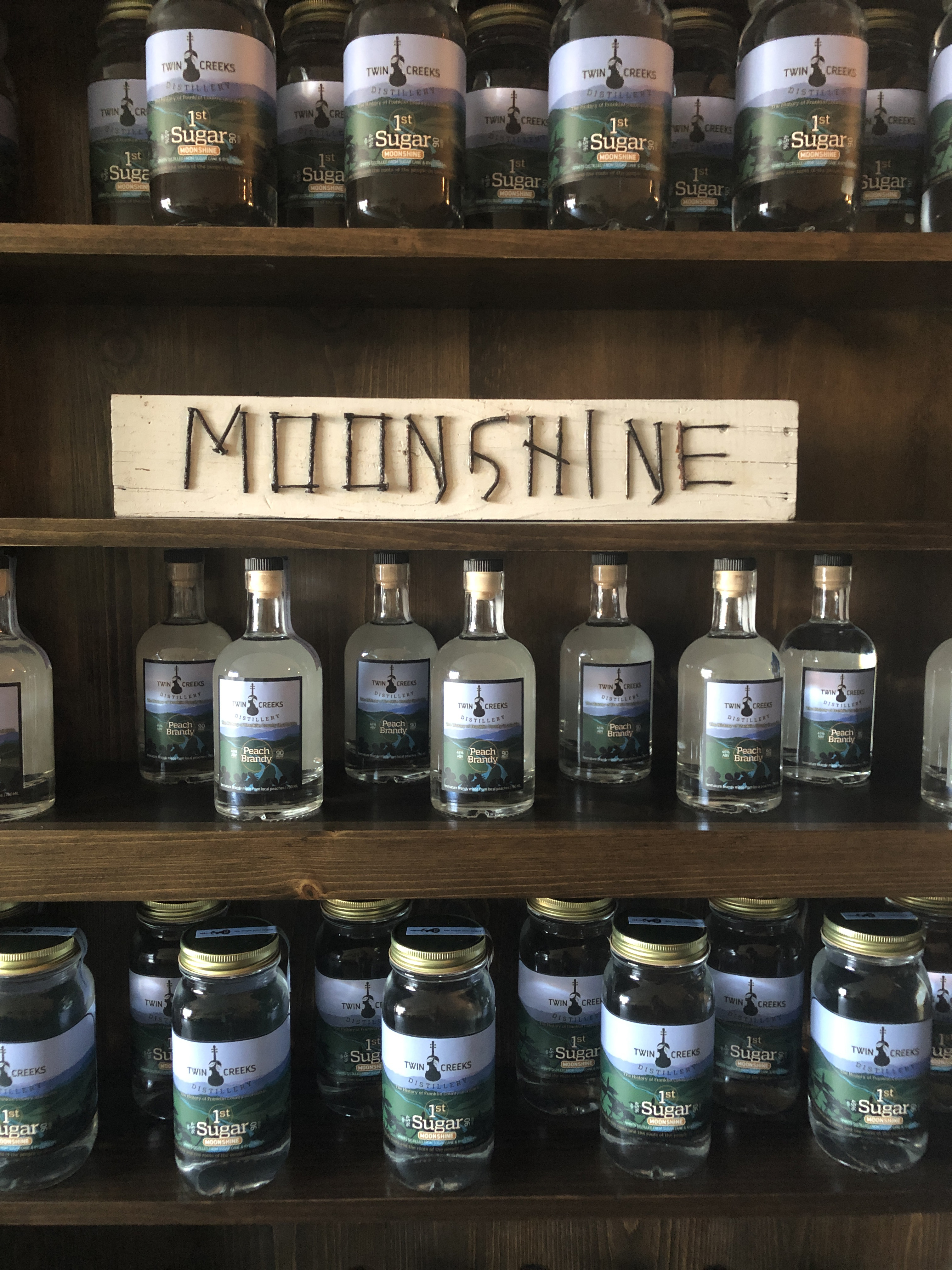 Moonshine for sale at Twin Creeks Distillery (Emilia Harris/PA)
