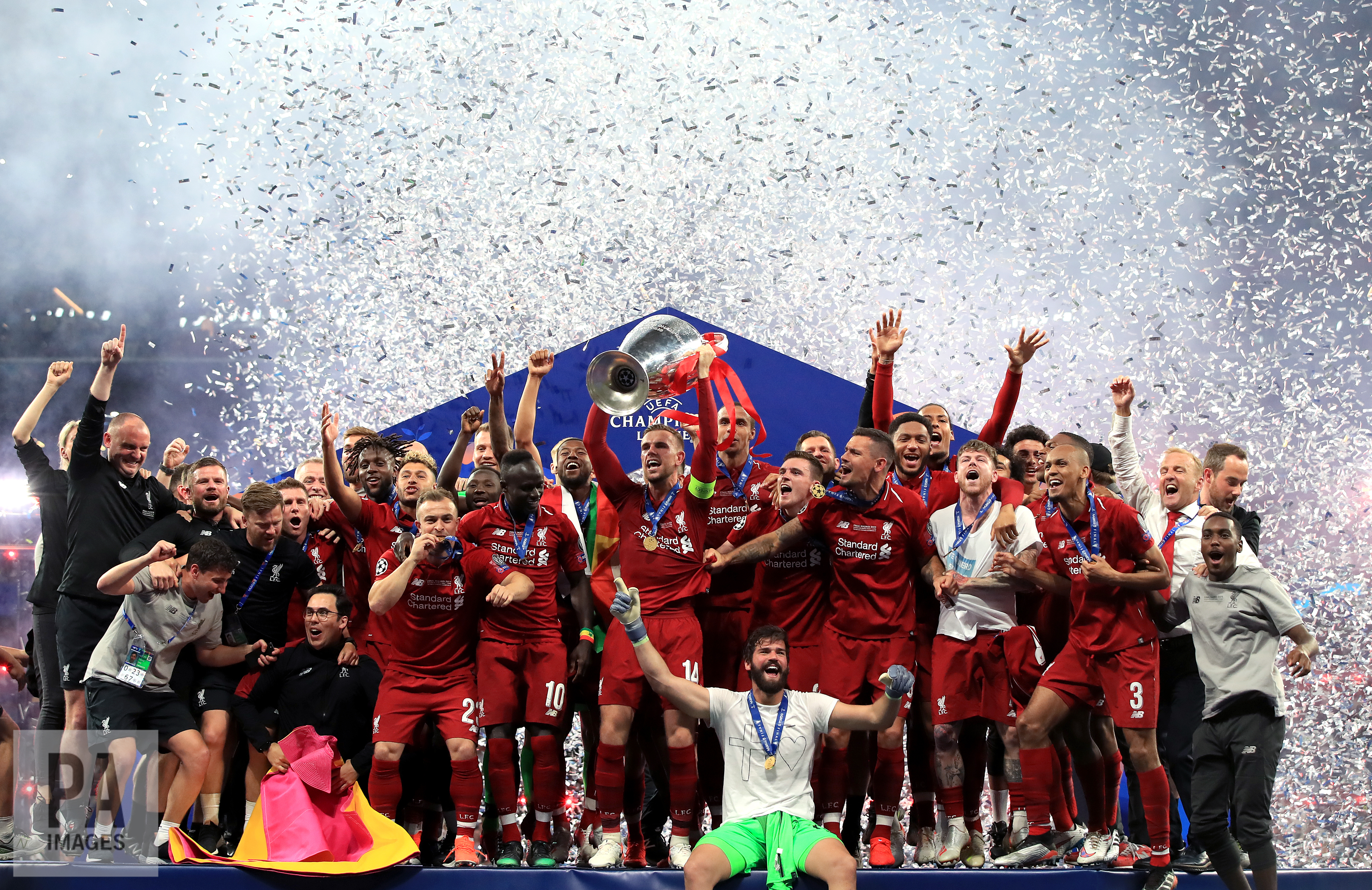 Liverpool players celebrate with the trophy after winning the UEFA Champions League Final
