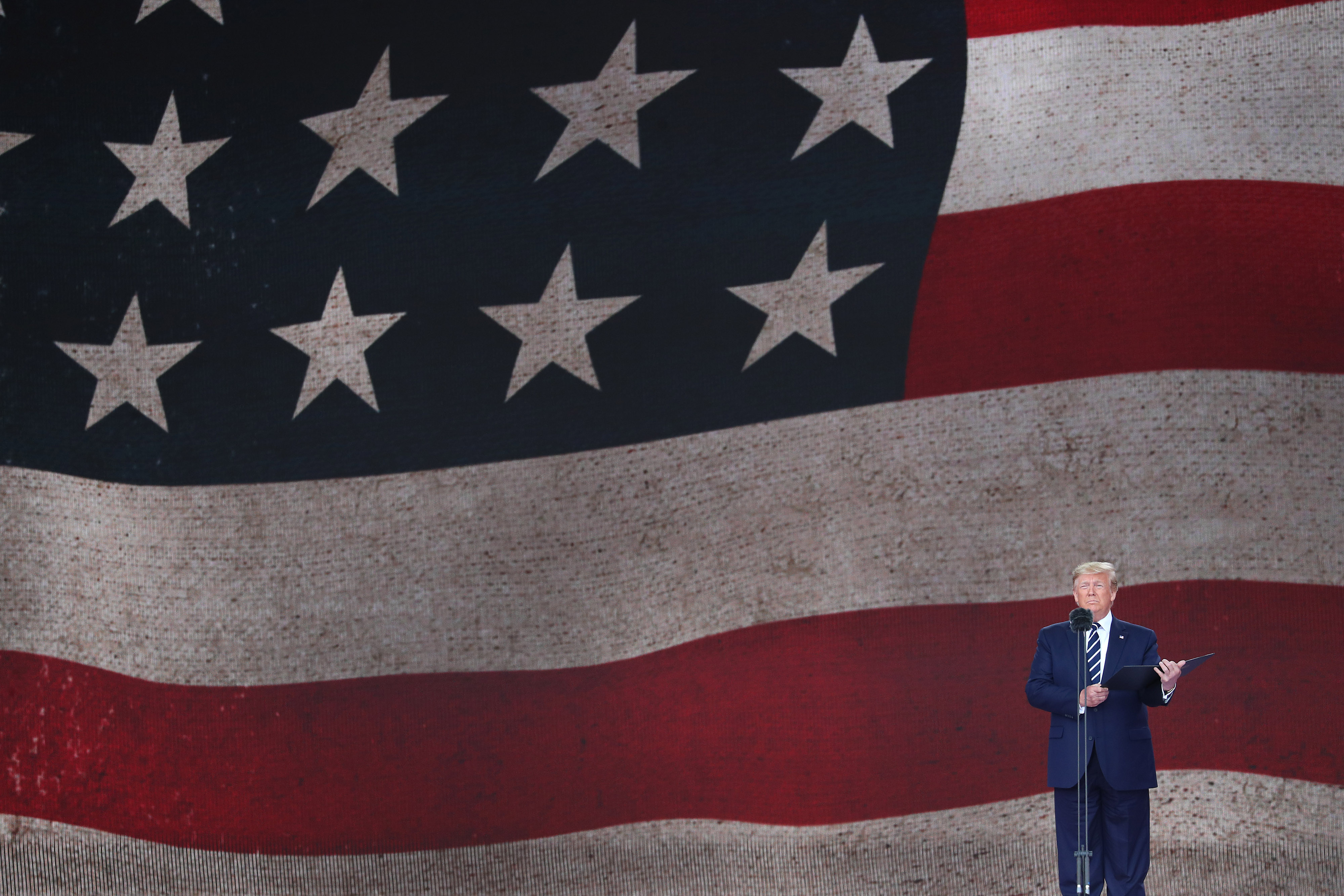 Mr Trump addresses the D-Day service