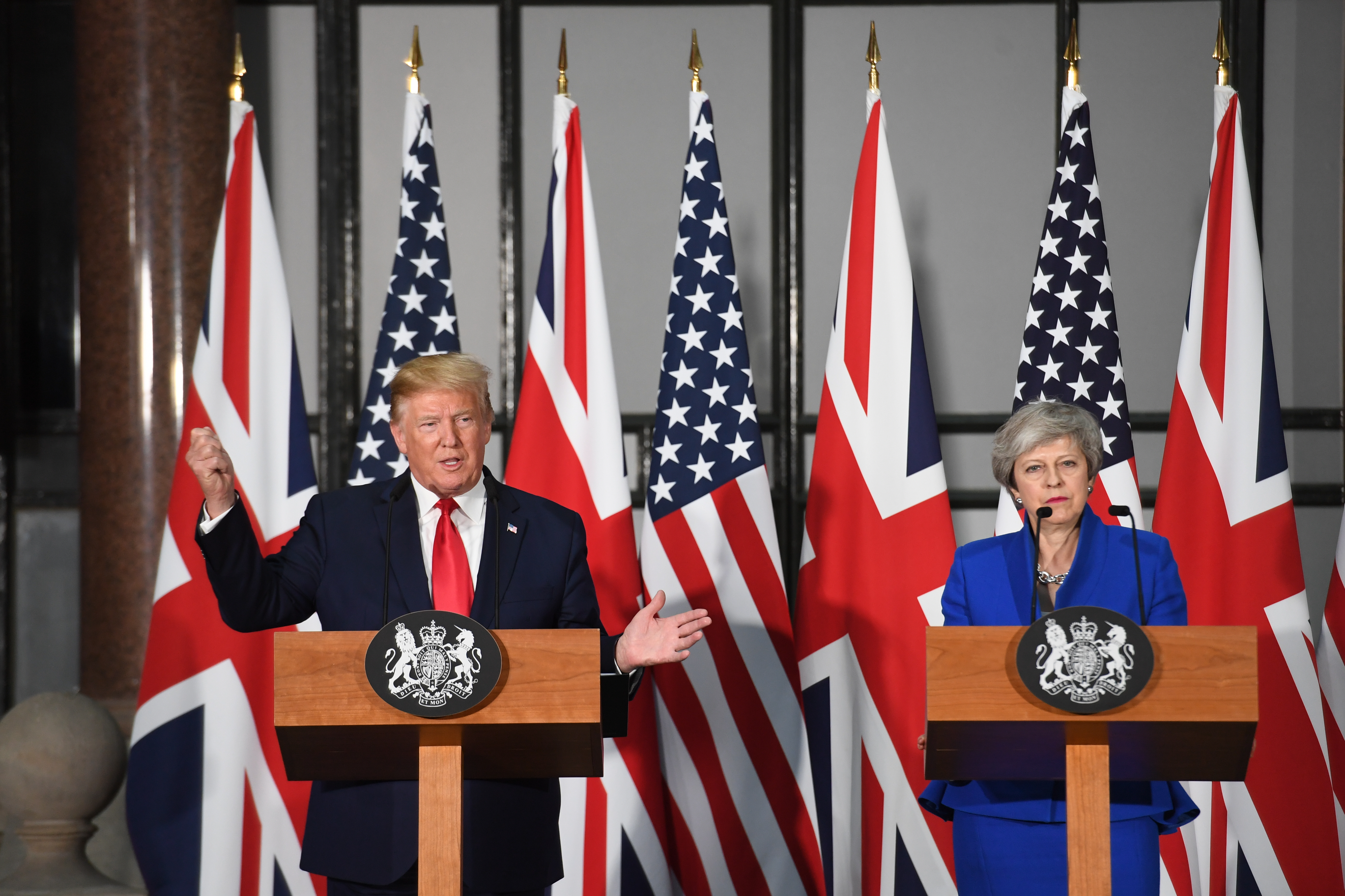Trump and Theresa May speak at the press conference