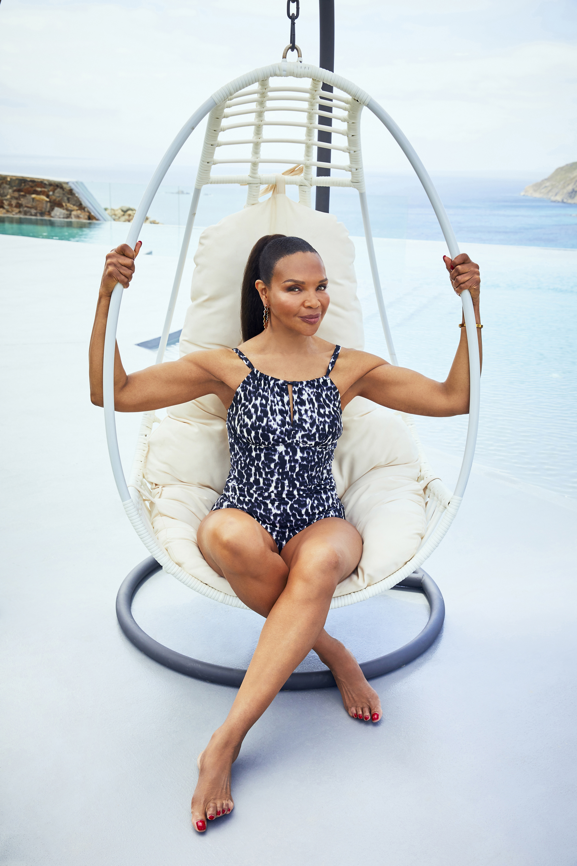 valerie morris-campbell wearing JD Williams Mono Animal Magiscult High Neck Swimsuit