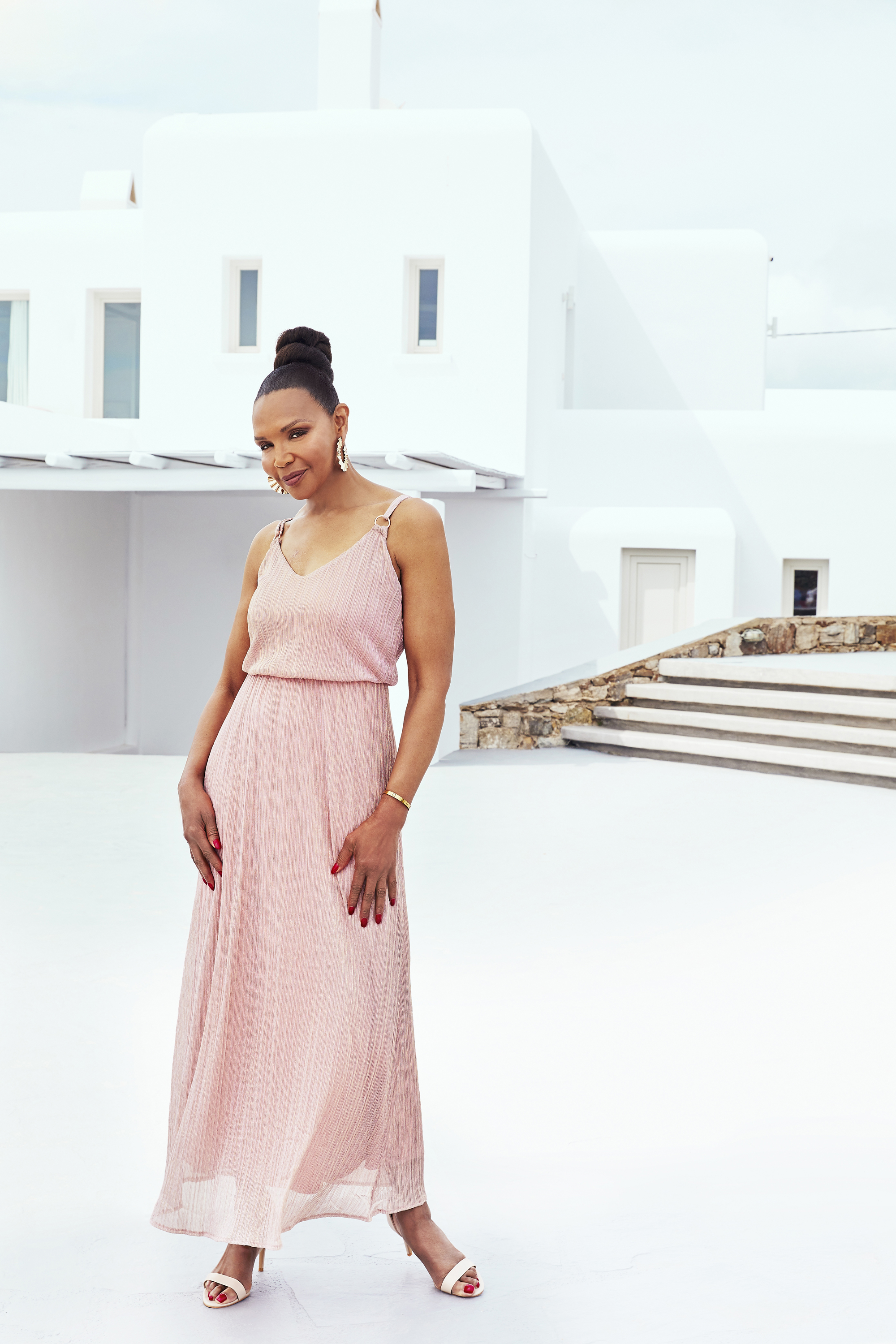 valerie morris-campbell wearing Joanna Hope Glitter Knit Maxi Dress; Morgan Barely There Sandals