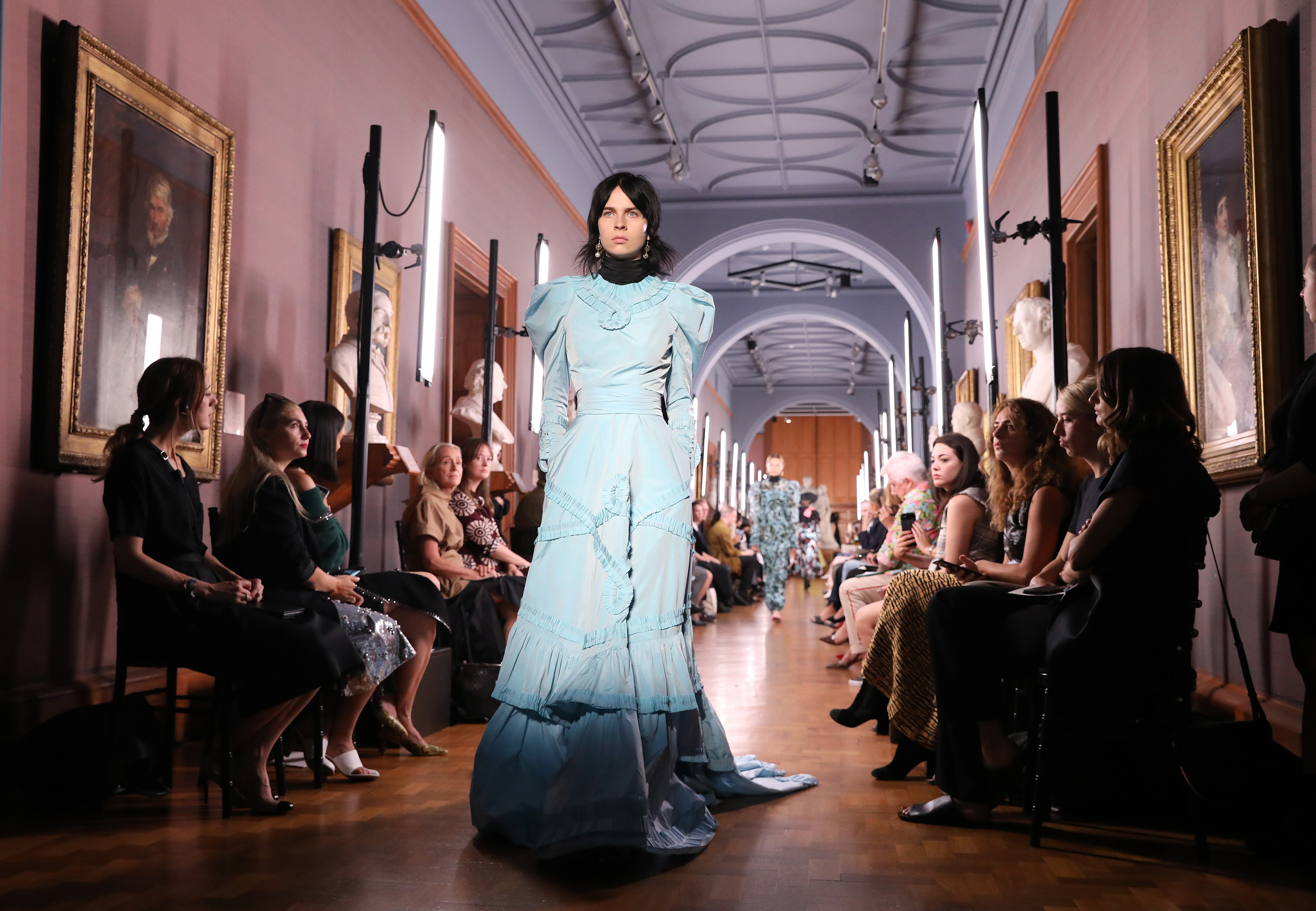 Models on the catwalk during the Erdem London Fashion Week September 2018 show at The National Portrait Gallery in London.