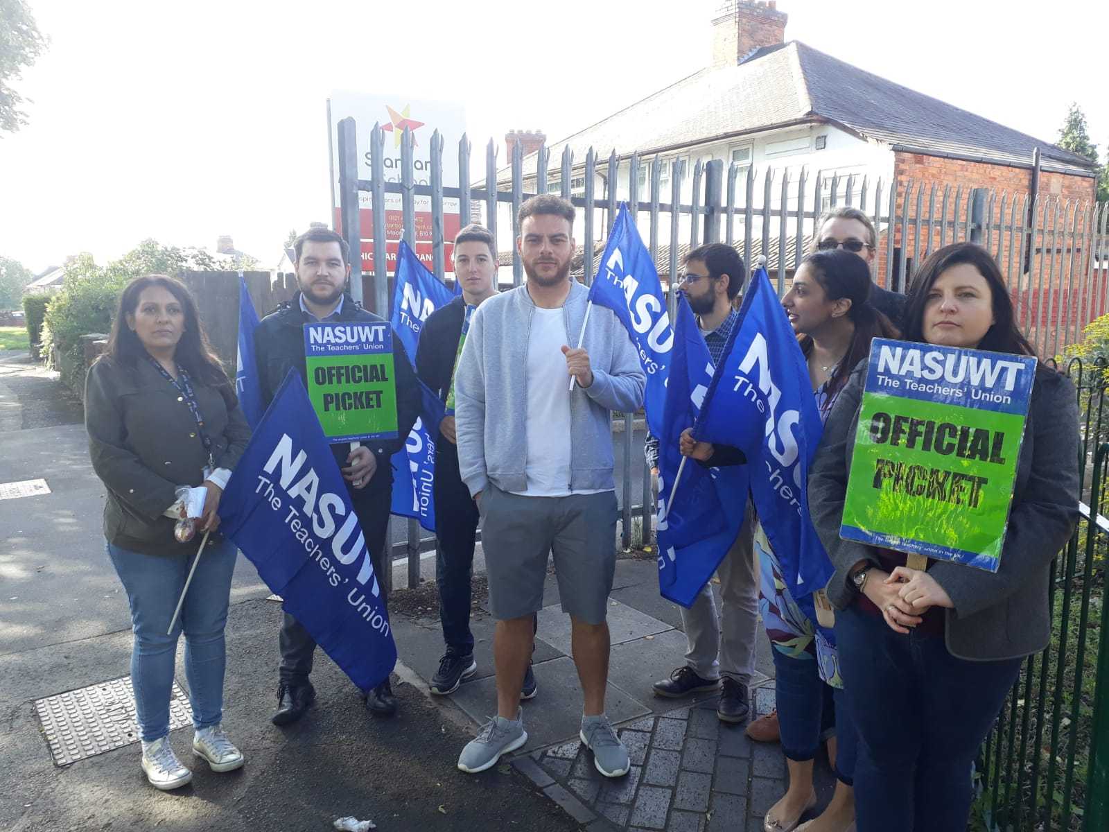 Staff outside Starbank School in Hob Moor Road, Birmingham, during a strike over concerns for staff and pupil safety. (Credit: NASUWT/PA)