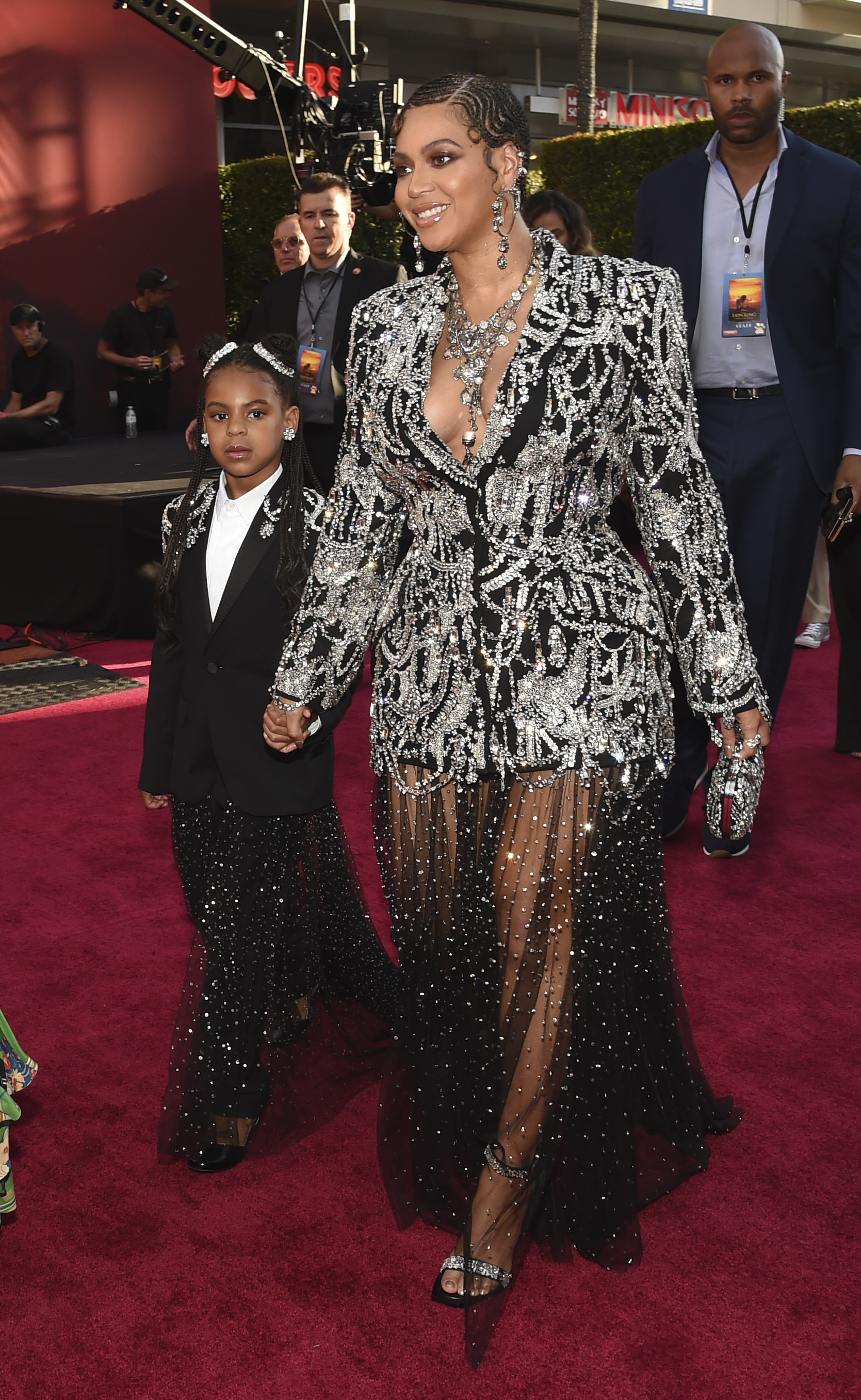 Beyonce, a cast member in "The Lion King," arrives with her daughter Blue Ivy at the premiere of the film, Tuesday, July 9, 2019, in Los Angeles