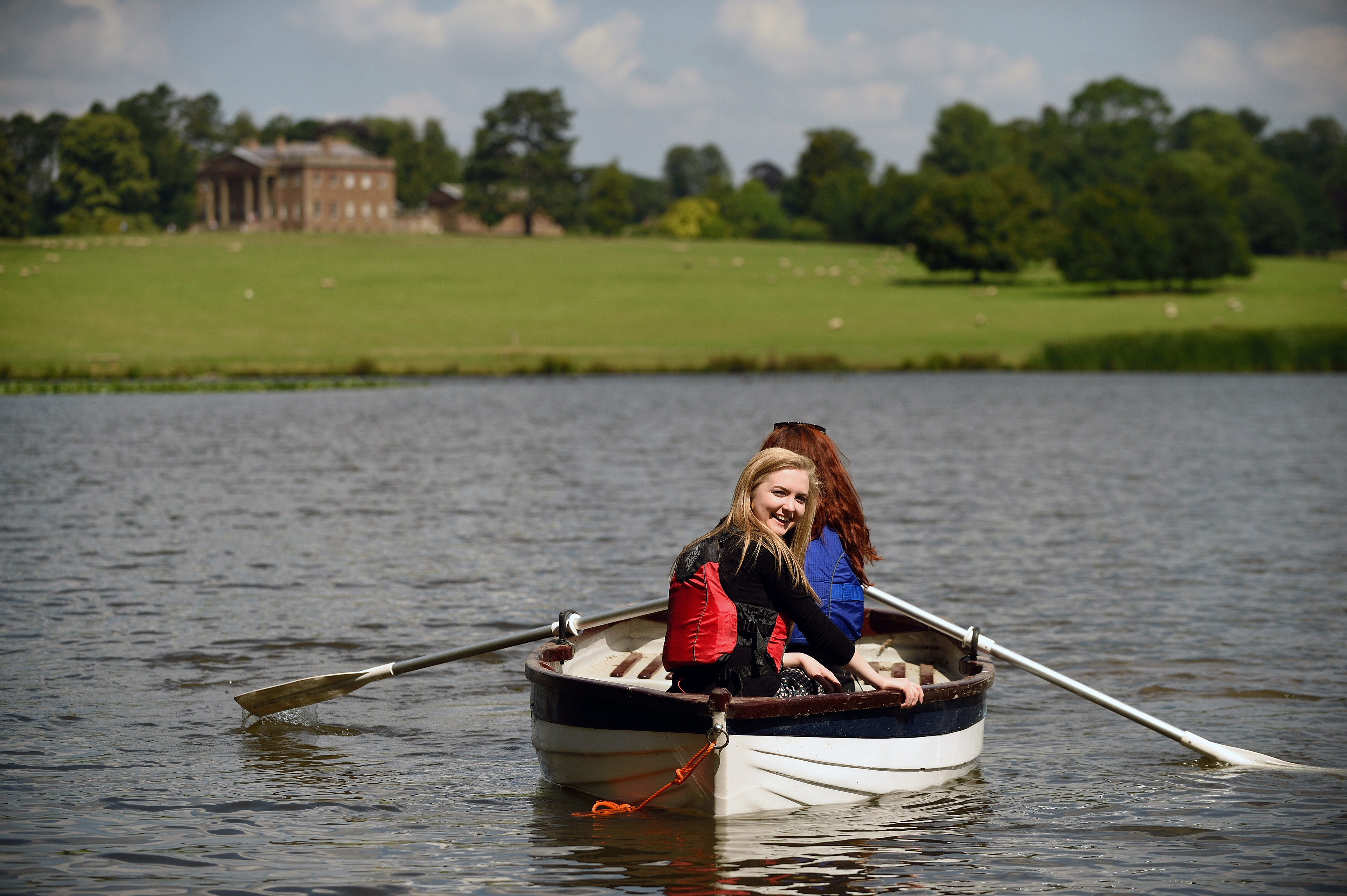 Visitors take to the water on Berrington Pool (John Millar/National Trust Images/PA)