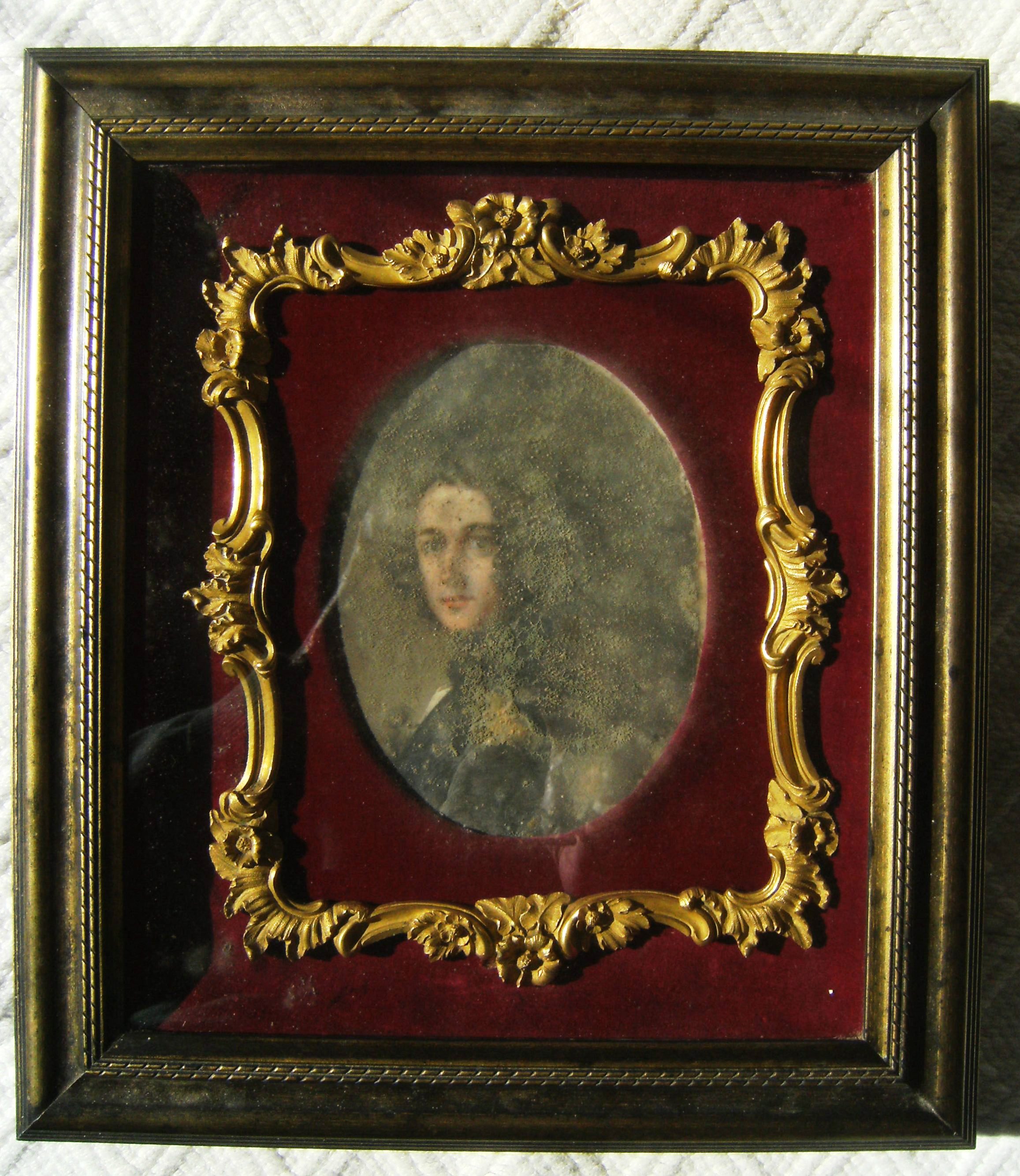 The portrait when it was covered in mould 