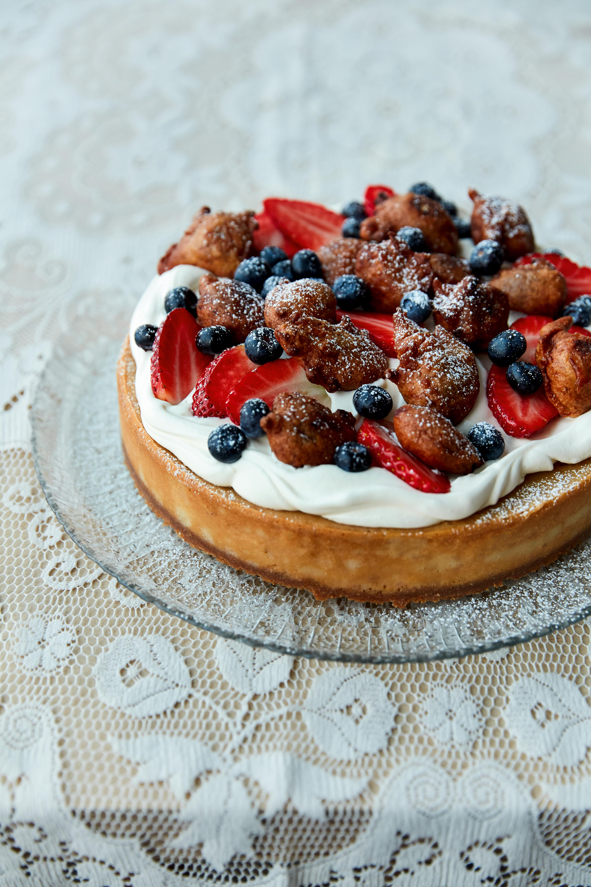 Banana fritter cheesecake from Original Flava: Caribbean Recipes from Home by Craig & Shaun McAnuff (Matt Russell/PA)