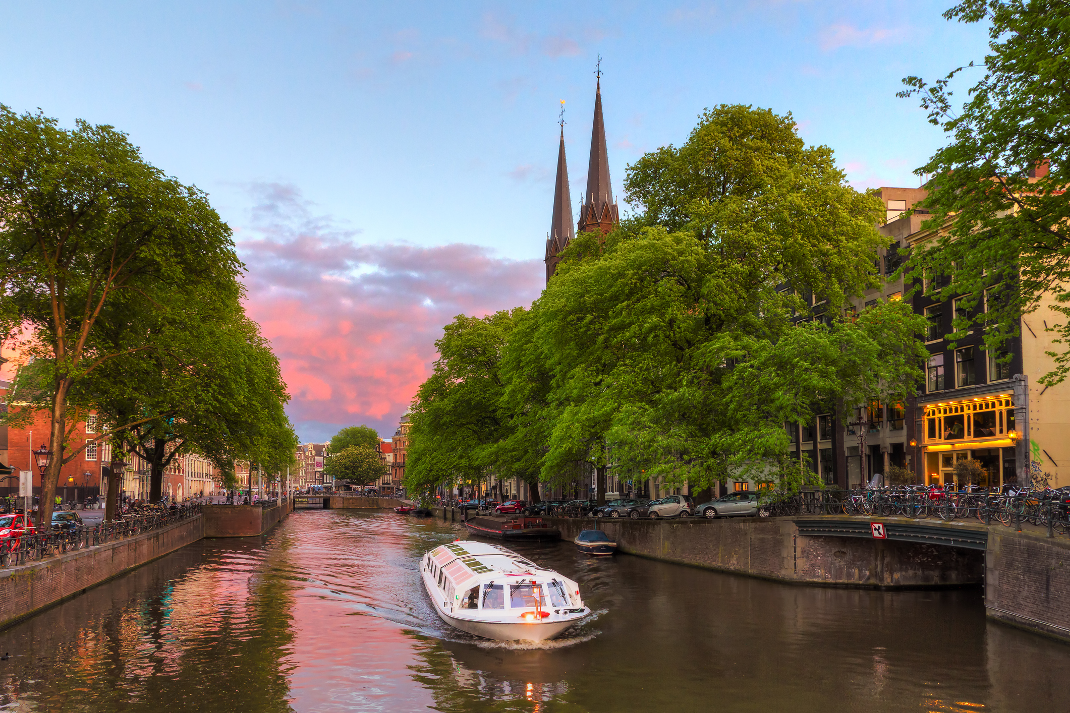 Sunset at the Singel canal in Amsterdam (iStock/PA)