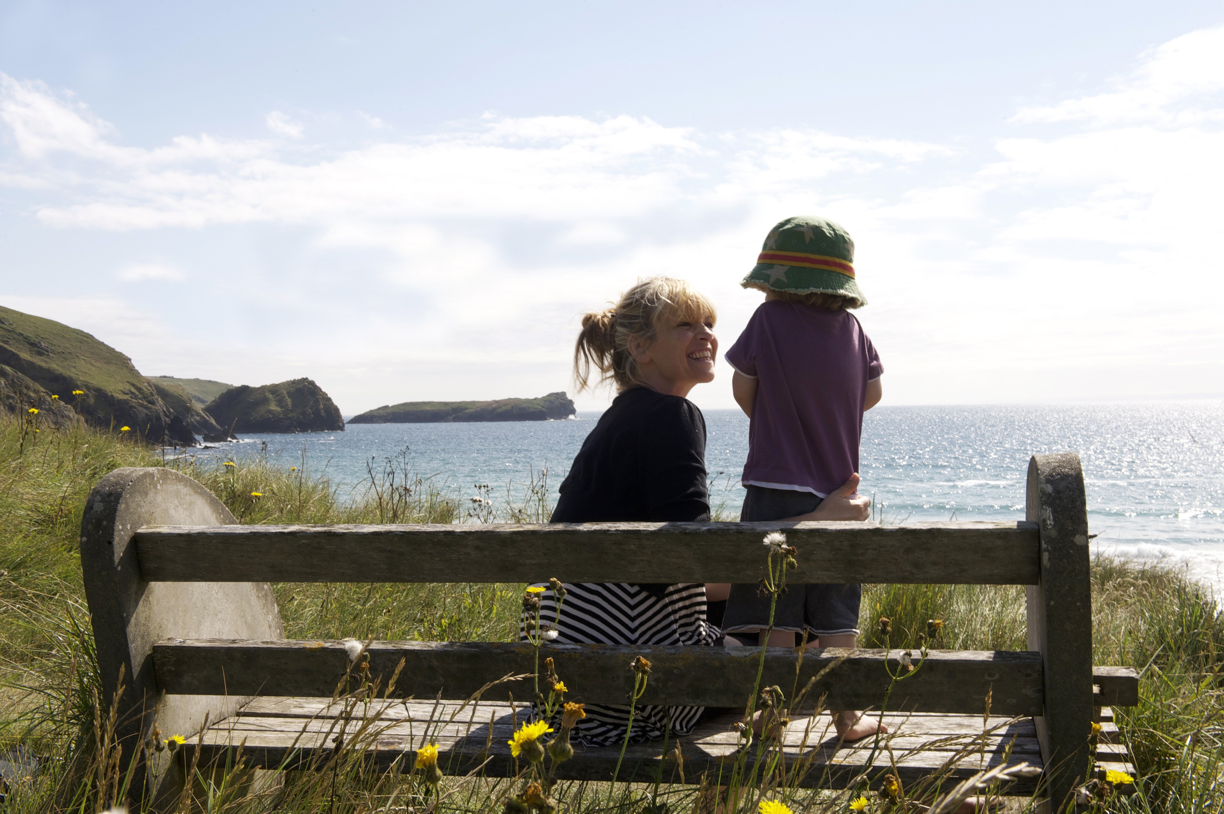 Mother and son on coastal path