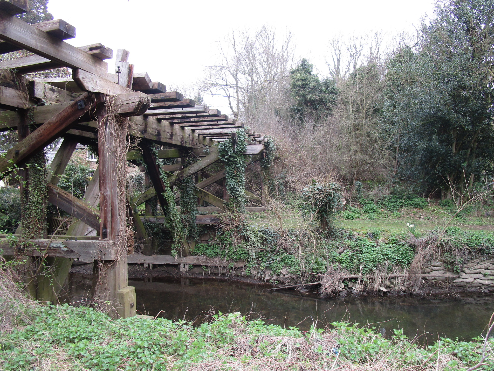 The last surviving timber trestle railway bridge in England has been added to the at risk list (Historic England/PA)