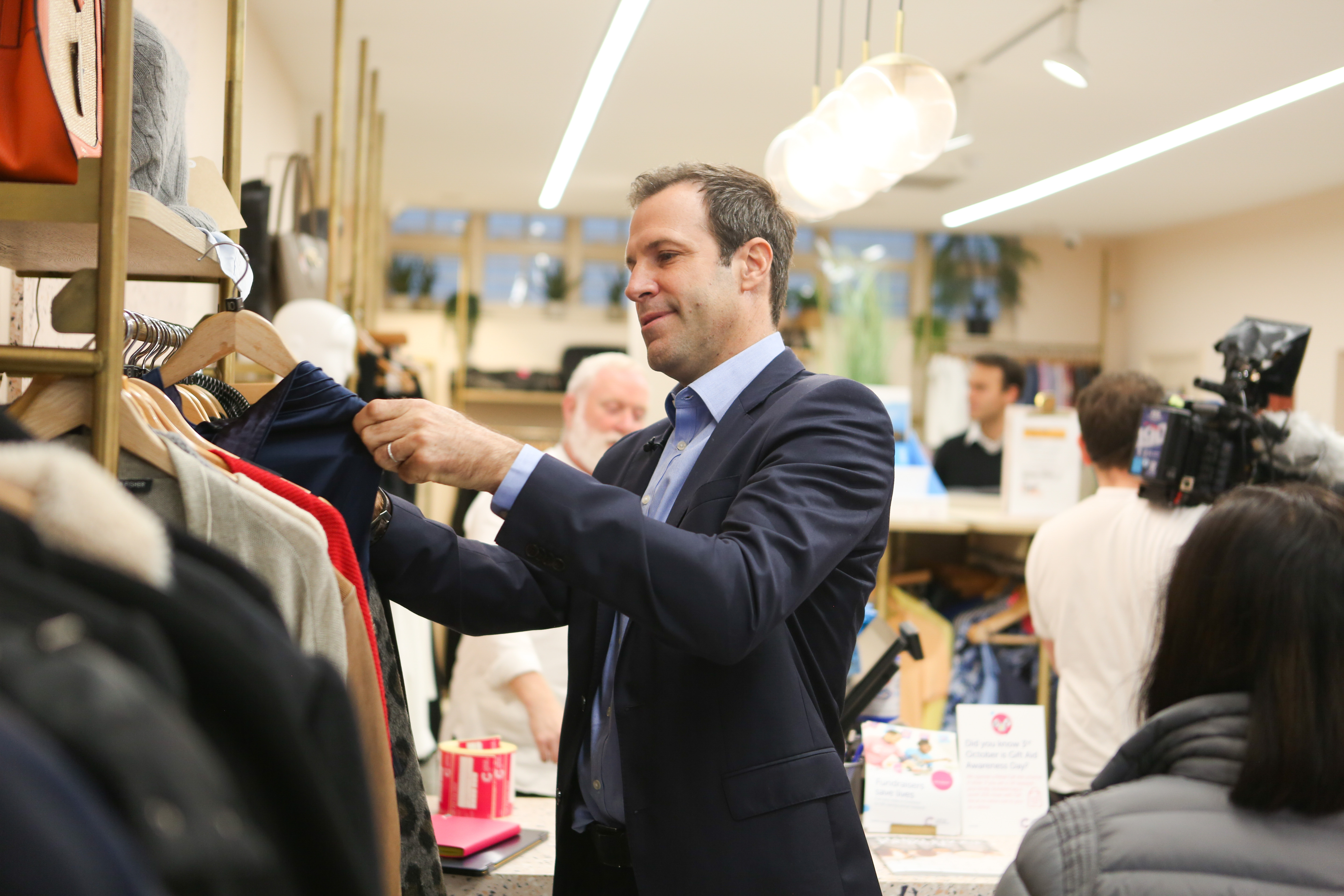 Greg Rusedski helped out at a Cancer Research UK shop to launch the charity's partnership with the Nitto ATP Finals