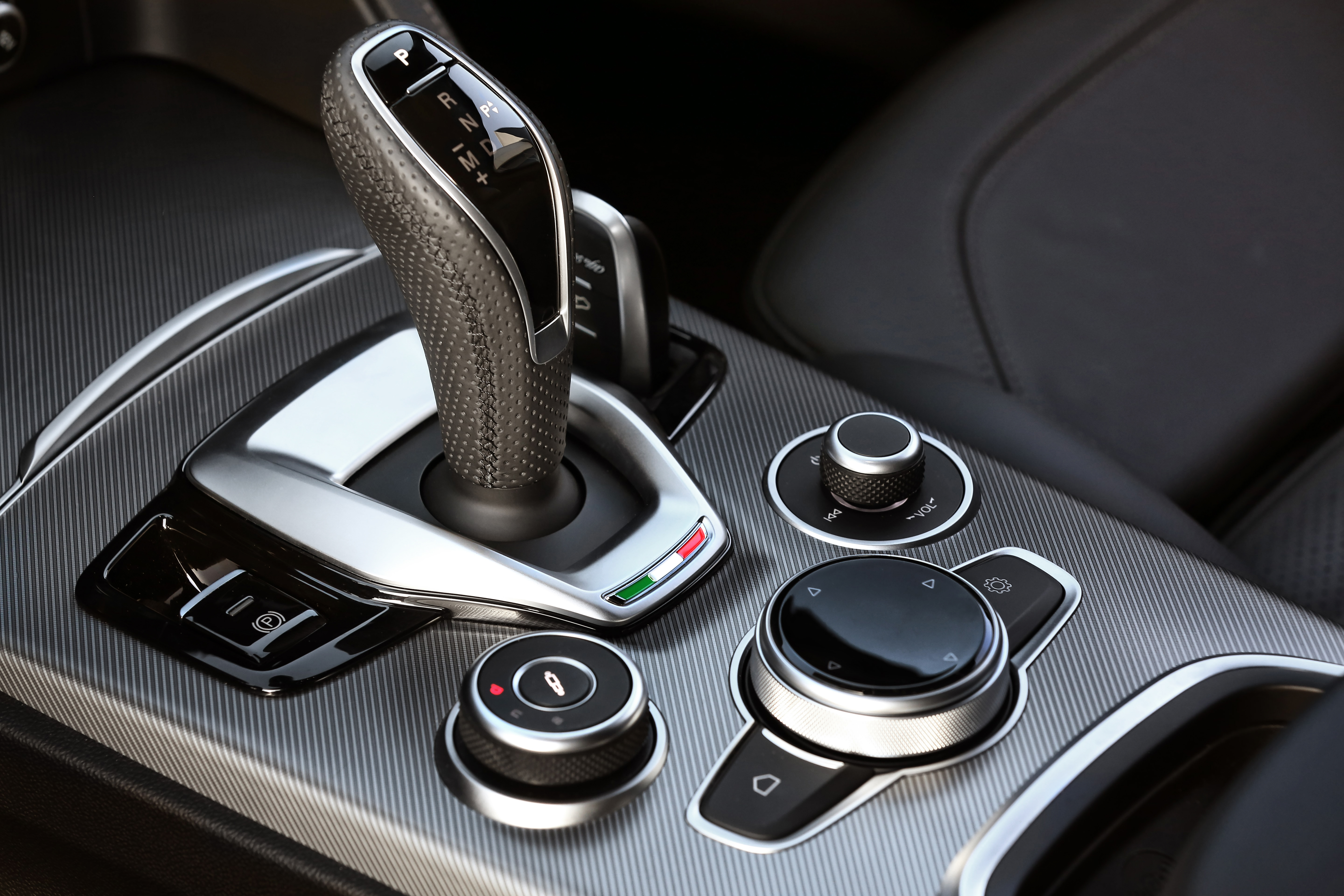 A new leather-wrapped gearstick sits in the middle