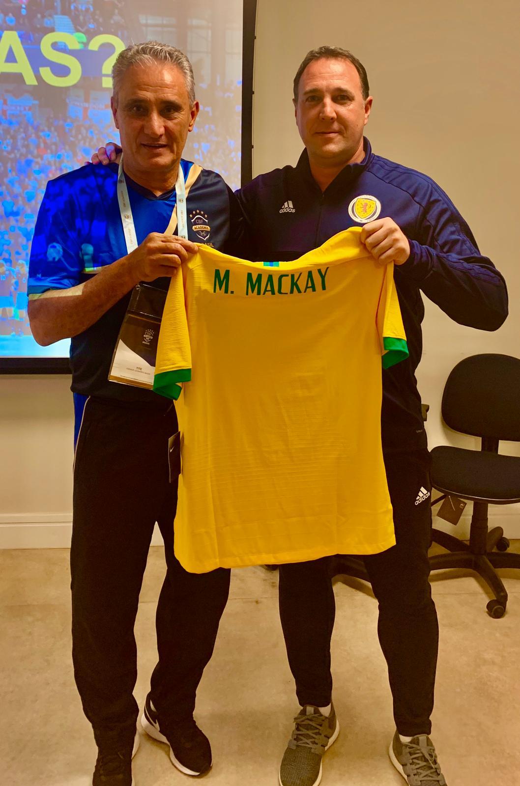 Malky Mackay presented with Brazil shirt by boss Tite 