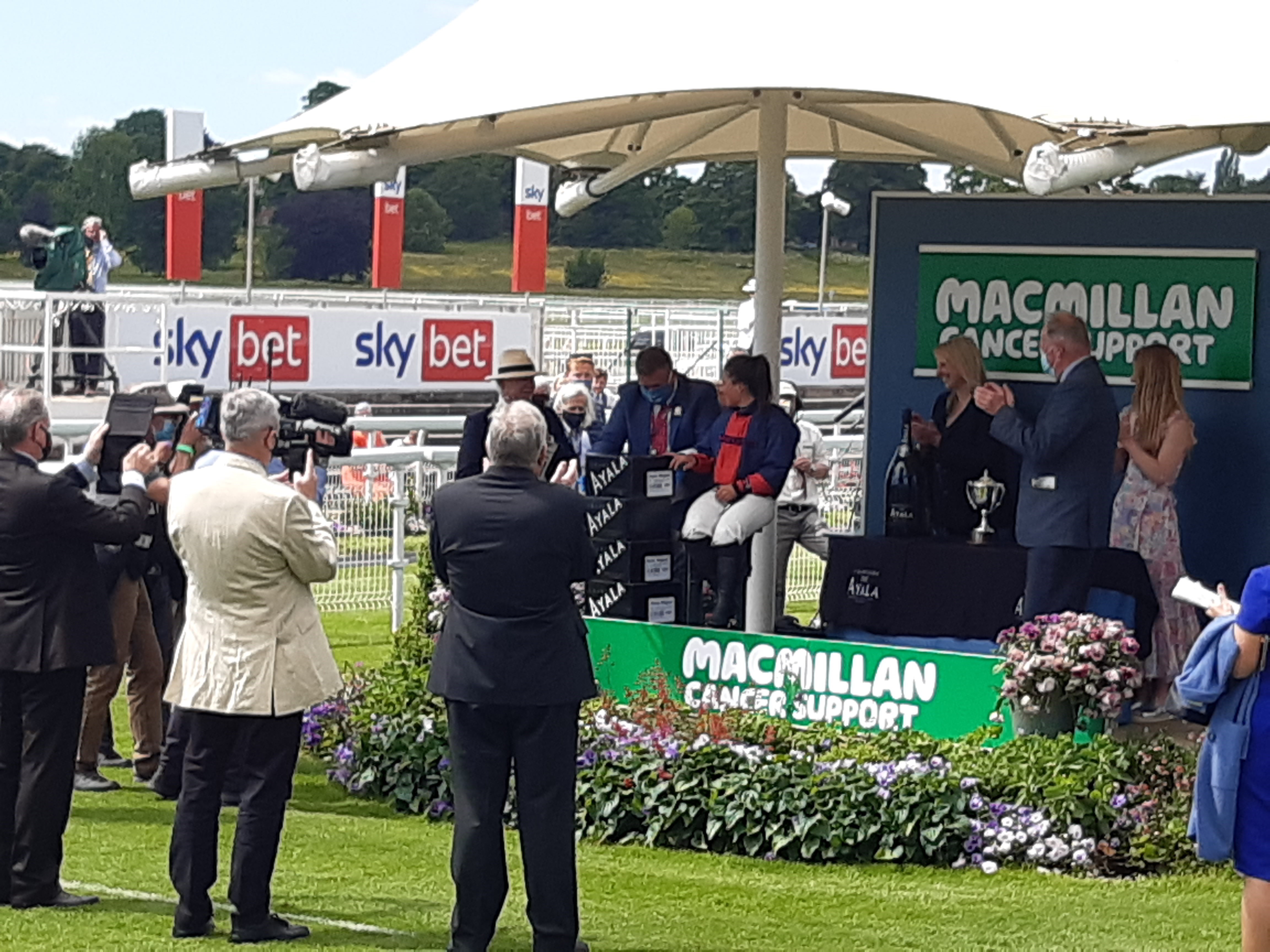 Amy Waugh being weighed in champagne
