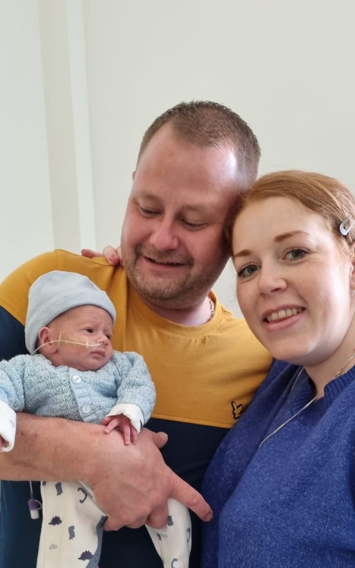 Faye and Mark Sayers, with their little boy Leonard