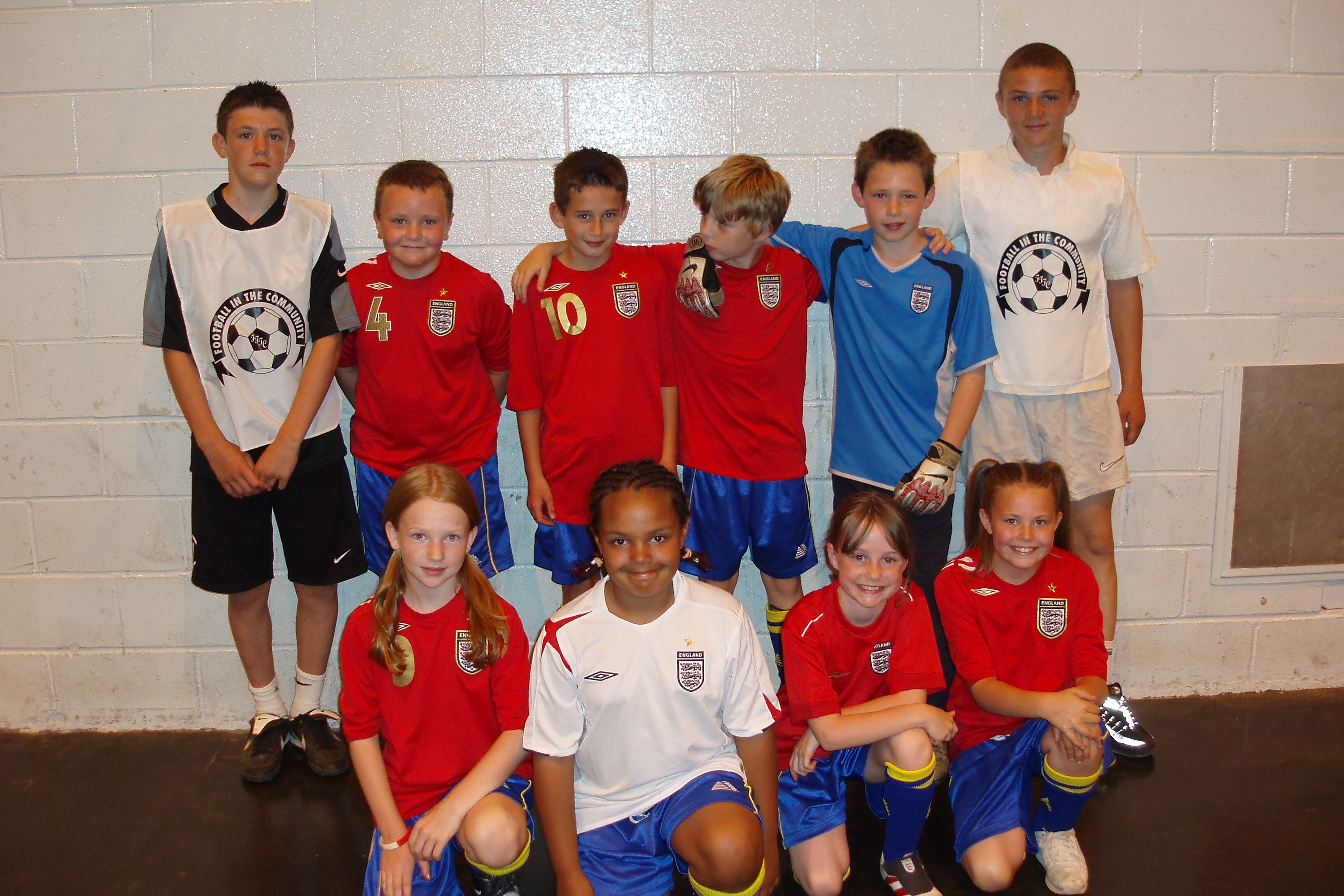 A 15-year-old Kieran Trippier with a team of primary school children he coached to victory in a mini-tournament