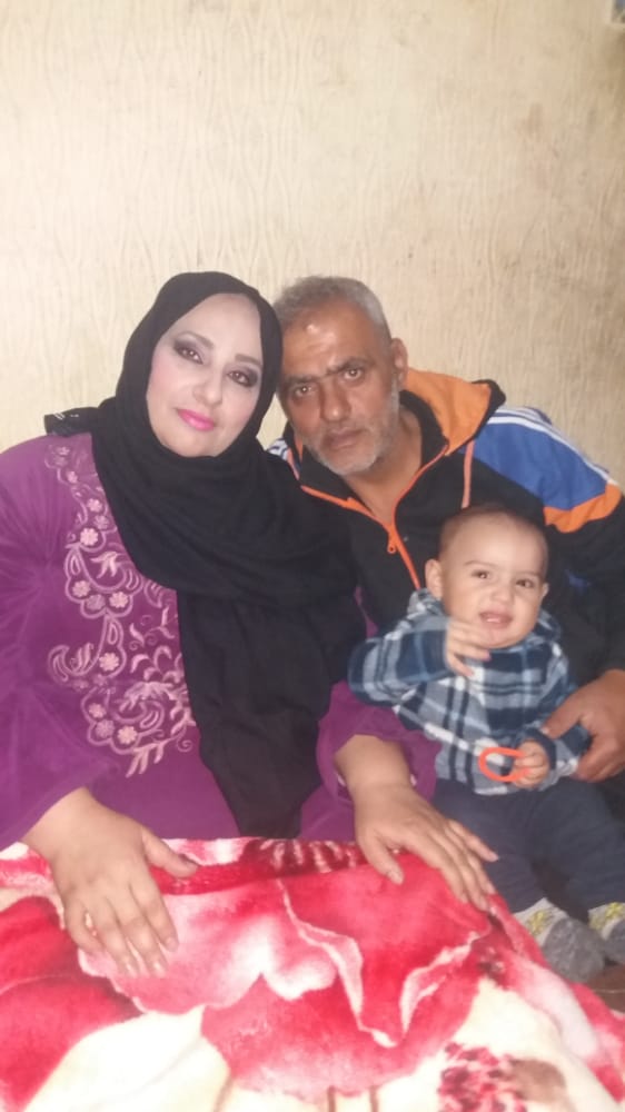 Mr Al Naboulssi, his wife and grandchild