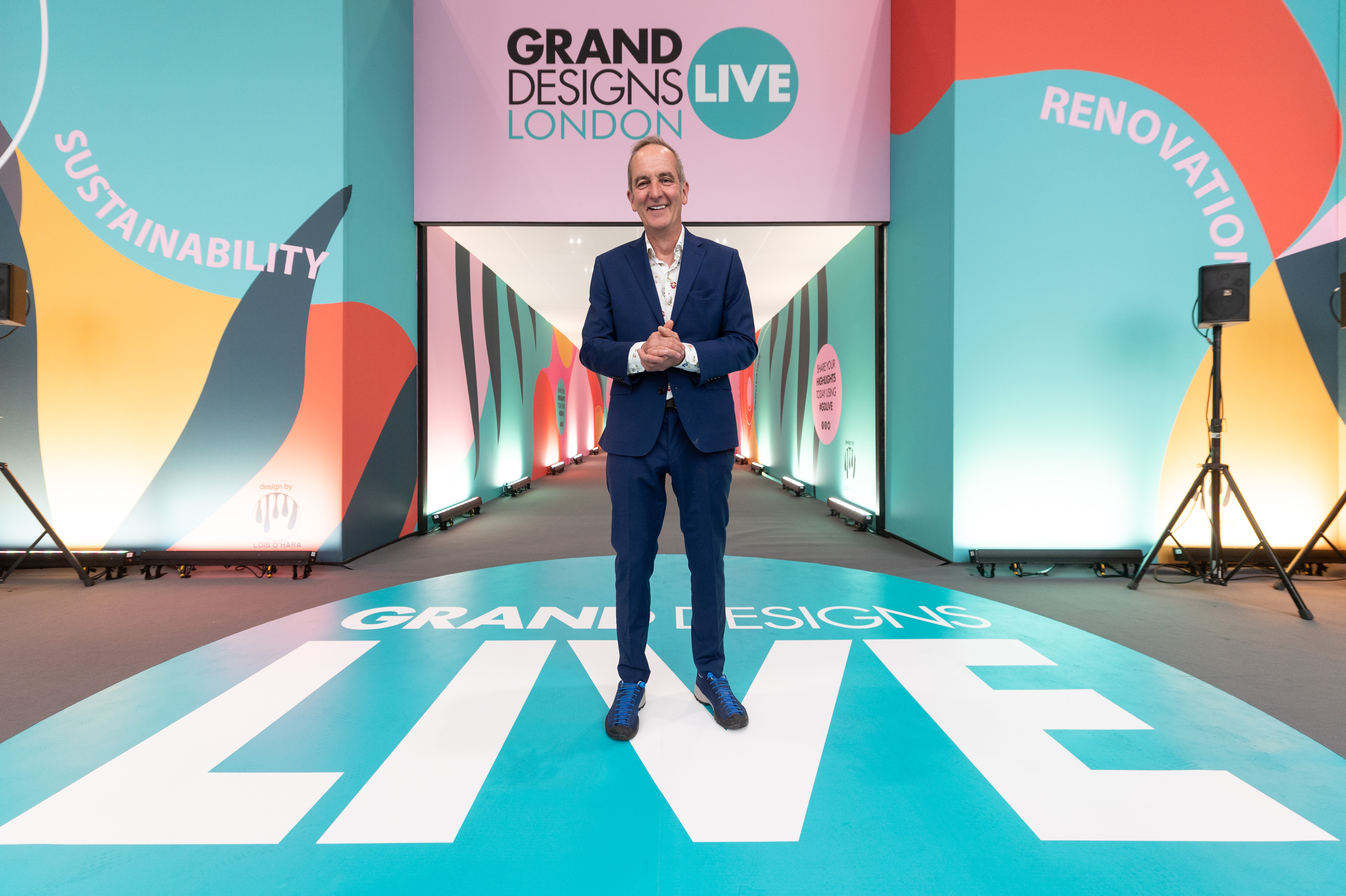 Kevin McCloud stands at the entrance to Grand Designs Live (Grand Designs Live/PA)