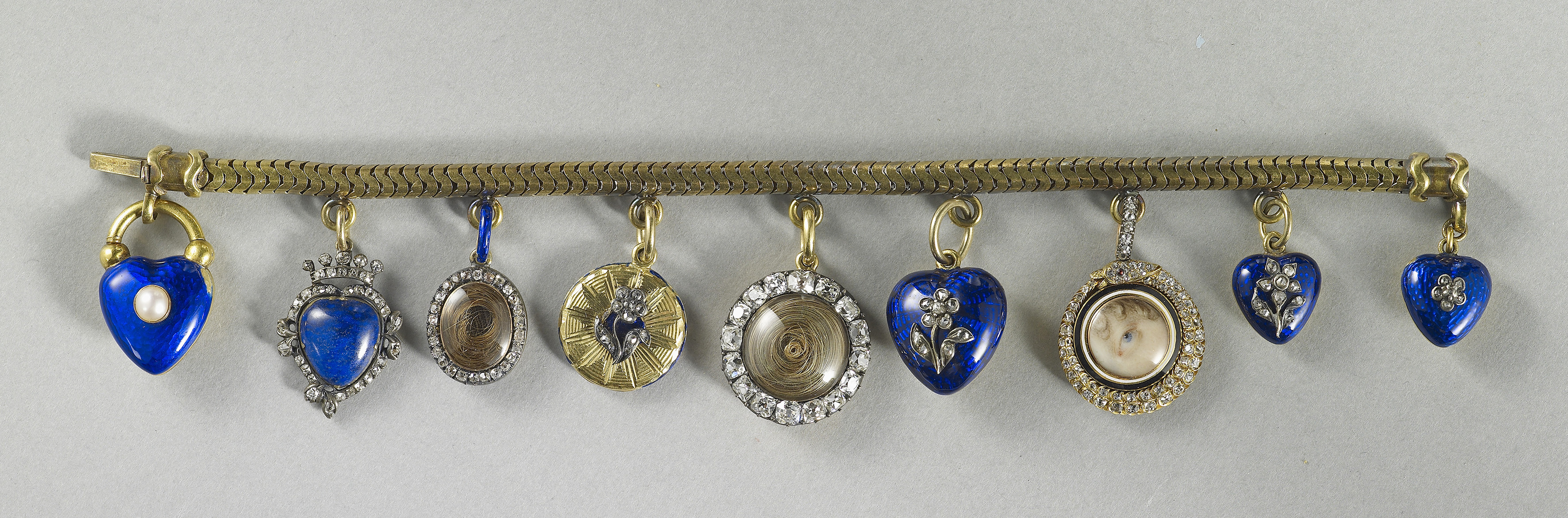 Bracelet with nine lockets, one with a miniature of Princess Charlotte's left eye