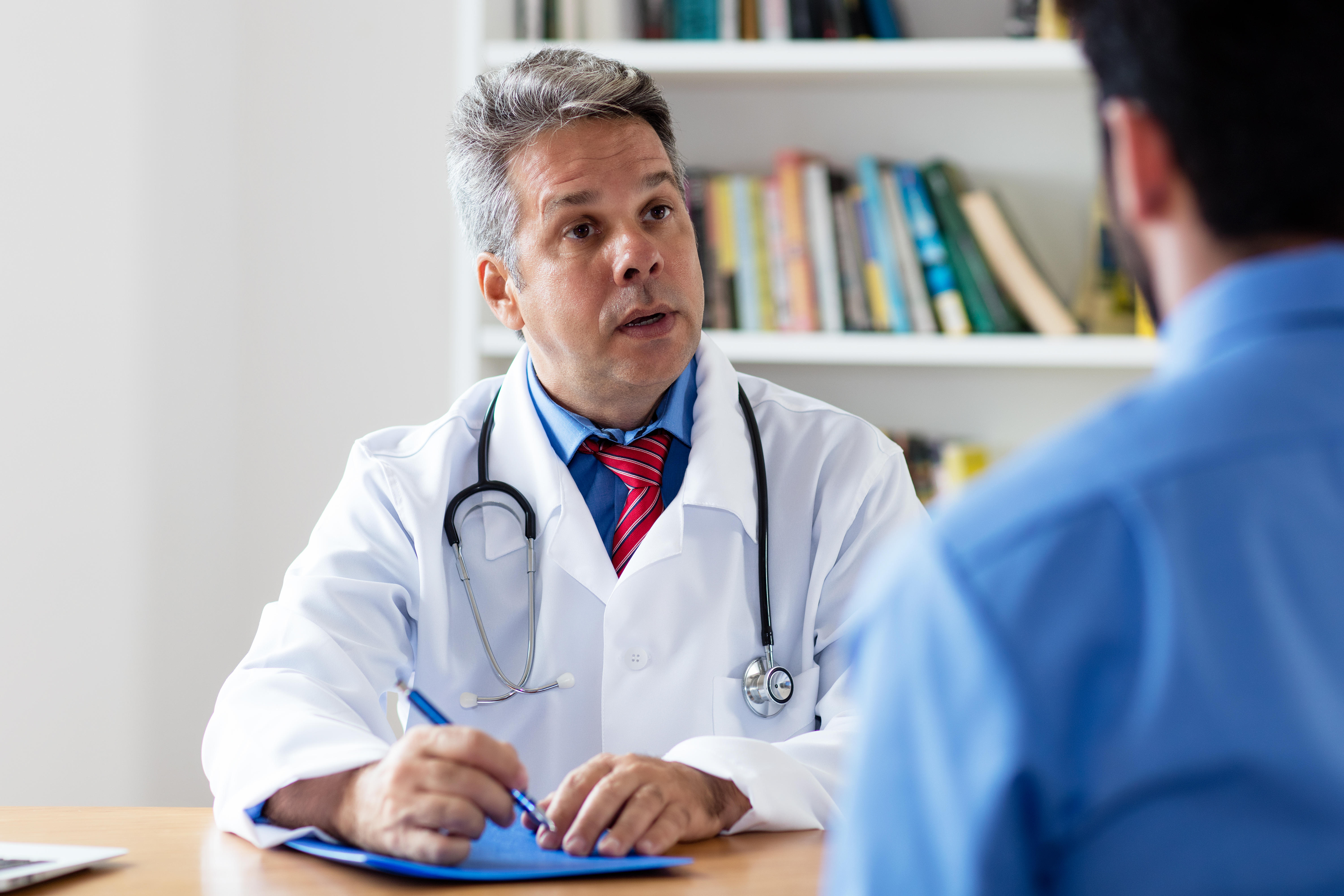 Doctor talking to patient