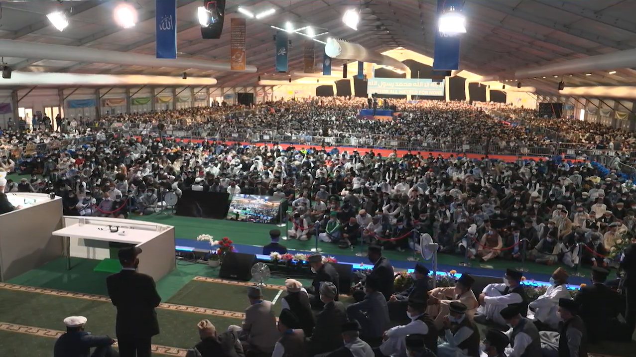 A large congregation gathering for Friday prayer at the convention 