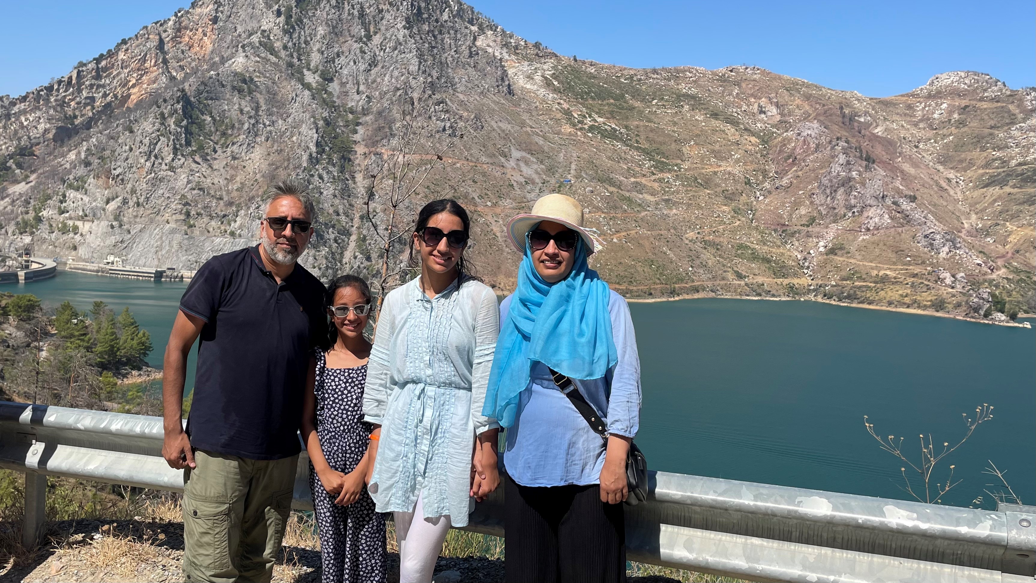 Imran Ahmed (far left), with his daughters, Amira (left), Zahra, (right) and his wife, Nazia (far right) stuck in Turkey after their flight was cancelled