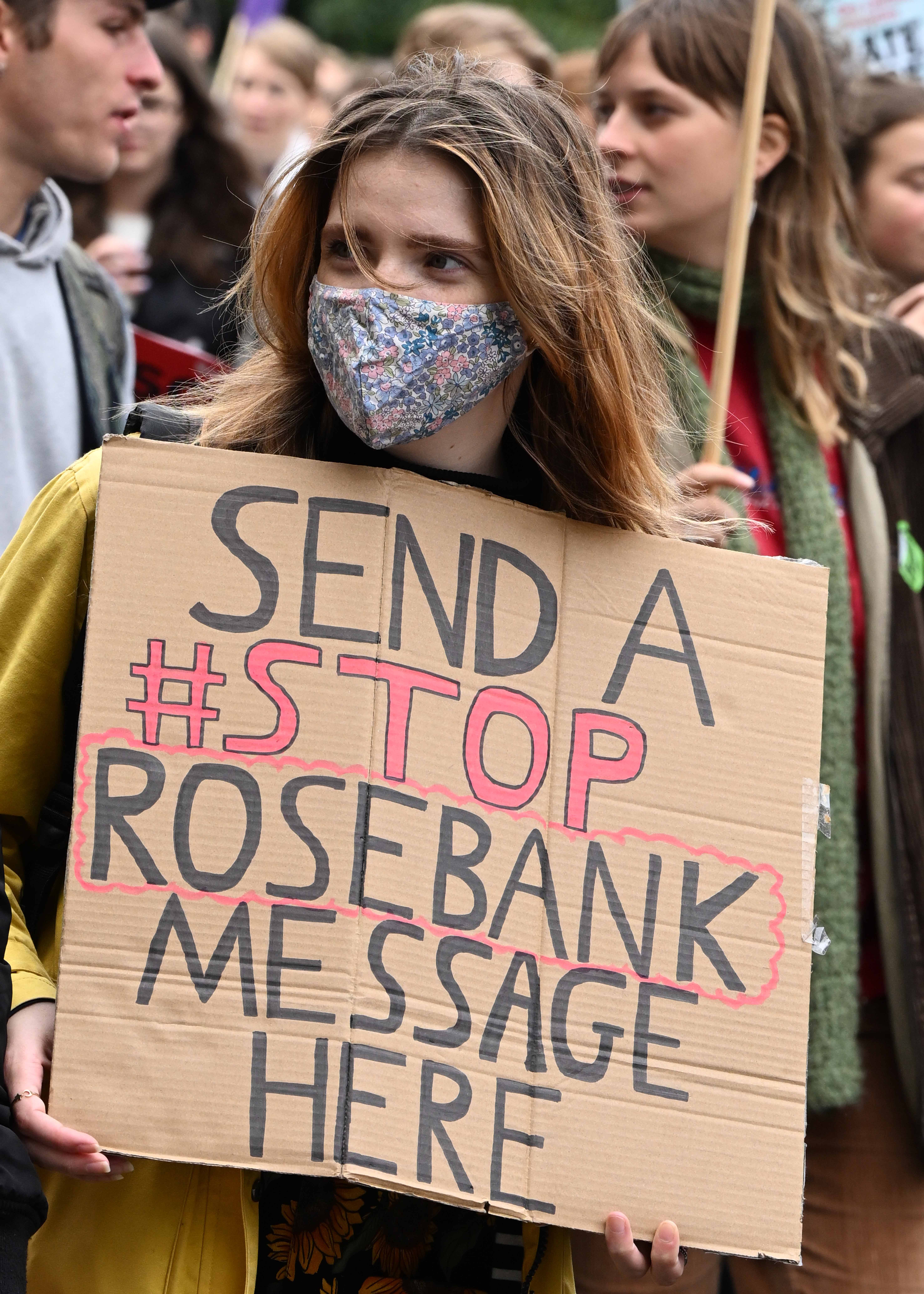 Edinburgh protester carrying sign