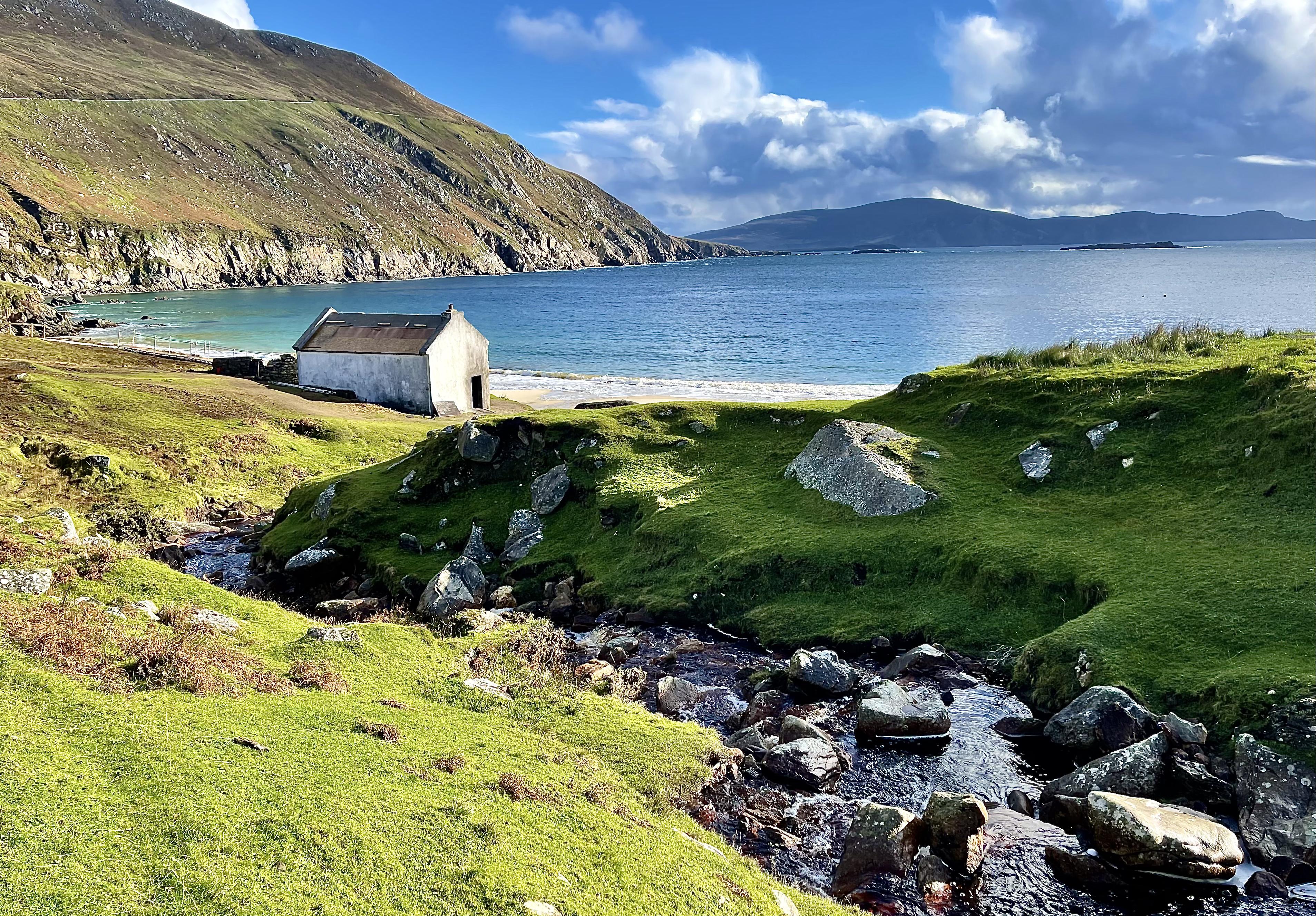 Cottage on Keem Beach, Achill Island (Alamy/PA)