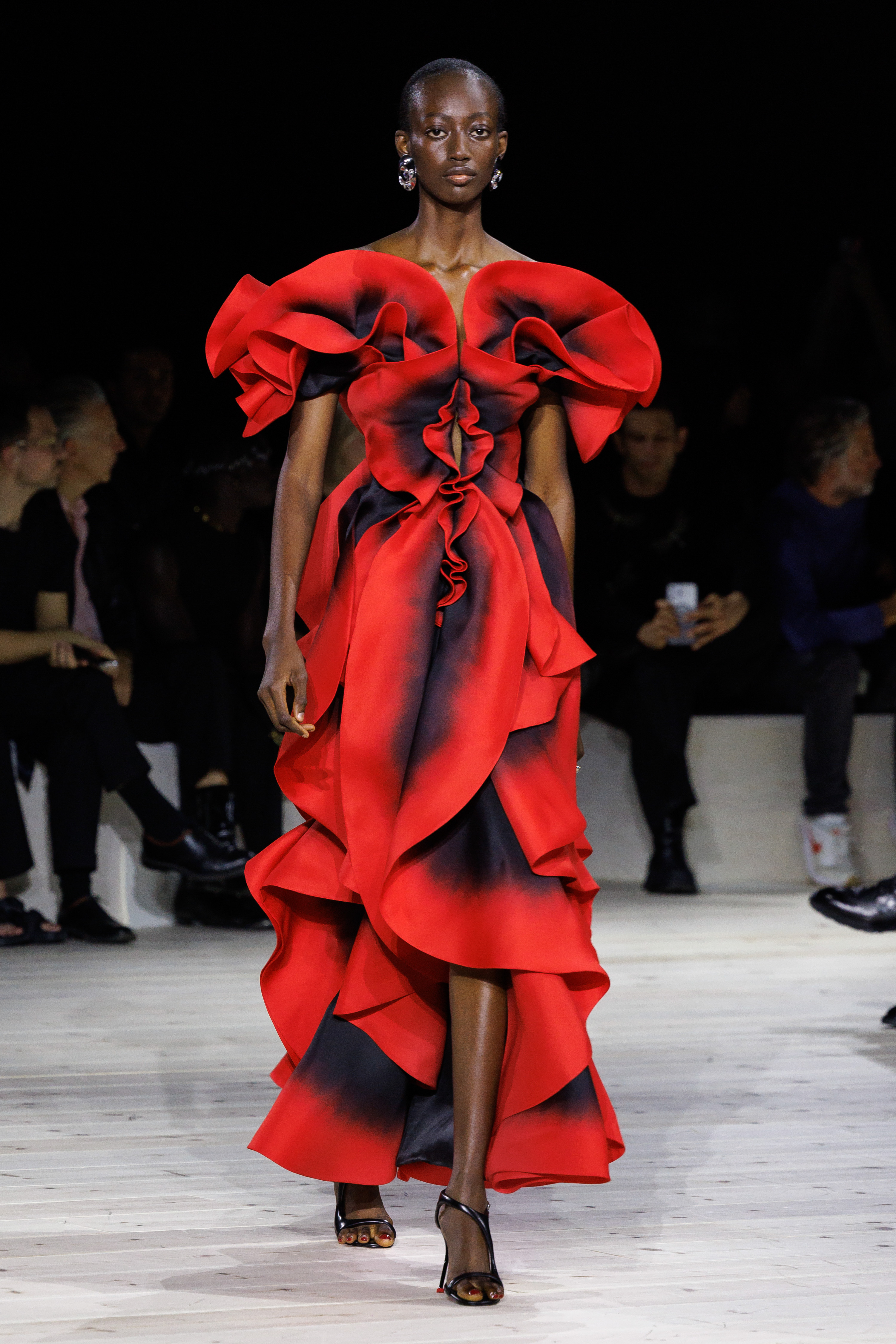 a model on the Alexander McQueen SS24 catwalk