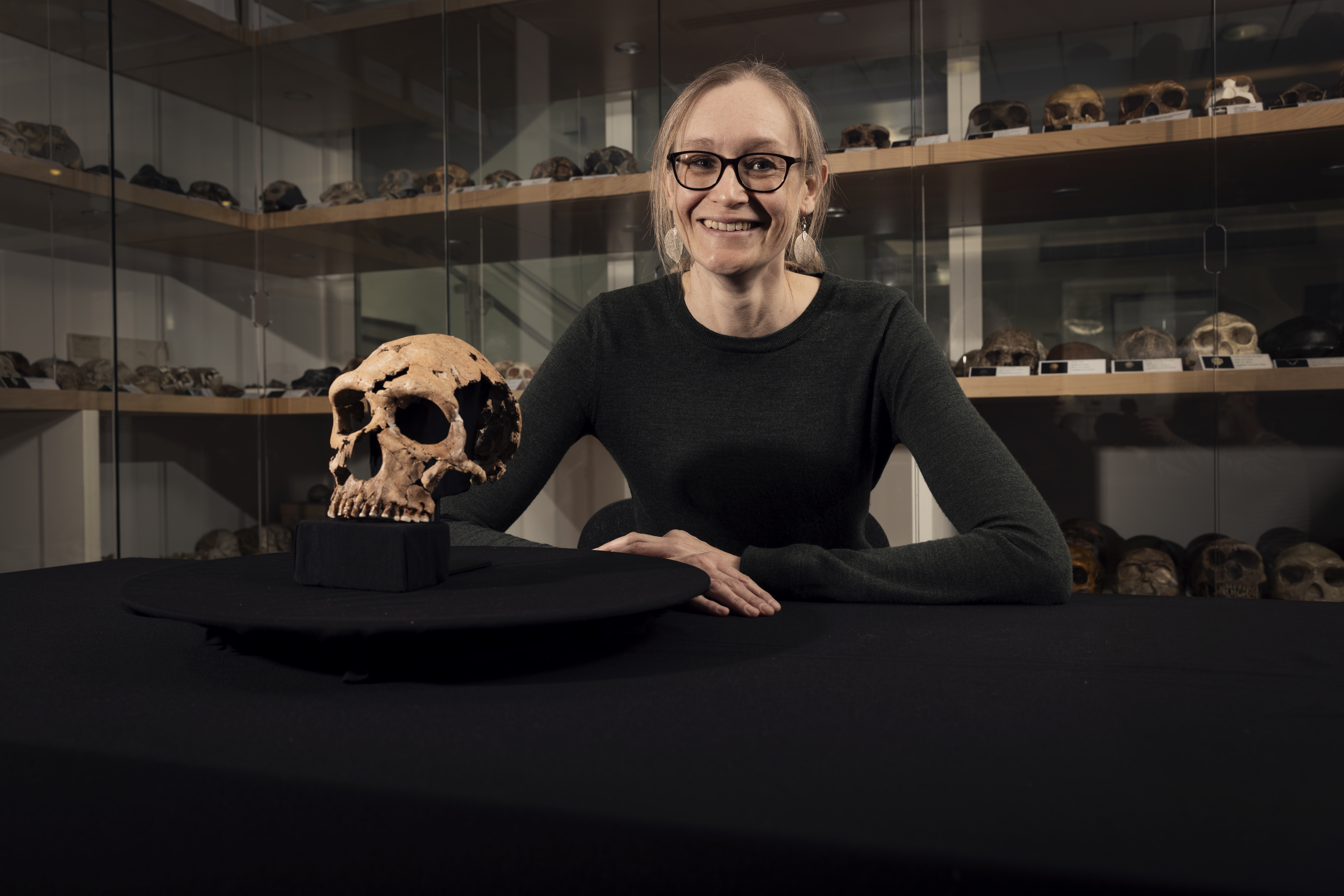 Dr Emma Pomeroy with the skull of Shanidar Z. (BBC Studios/Jamie Simonds/ PA)