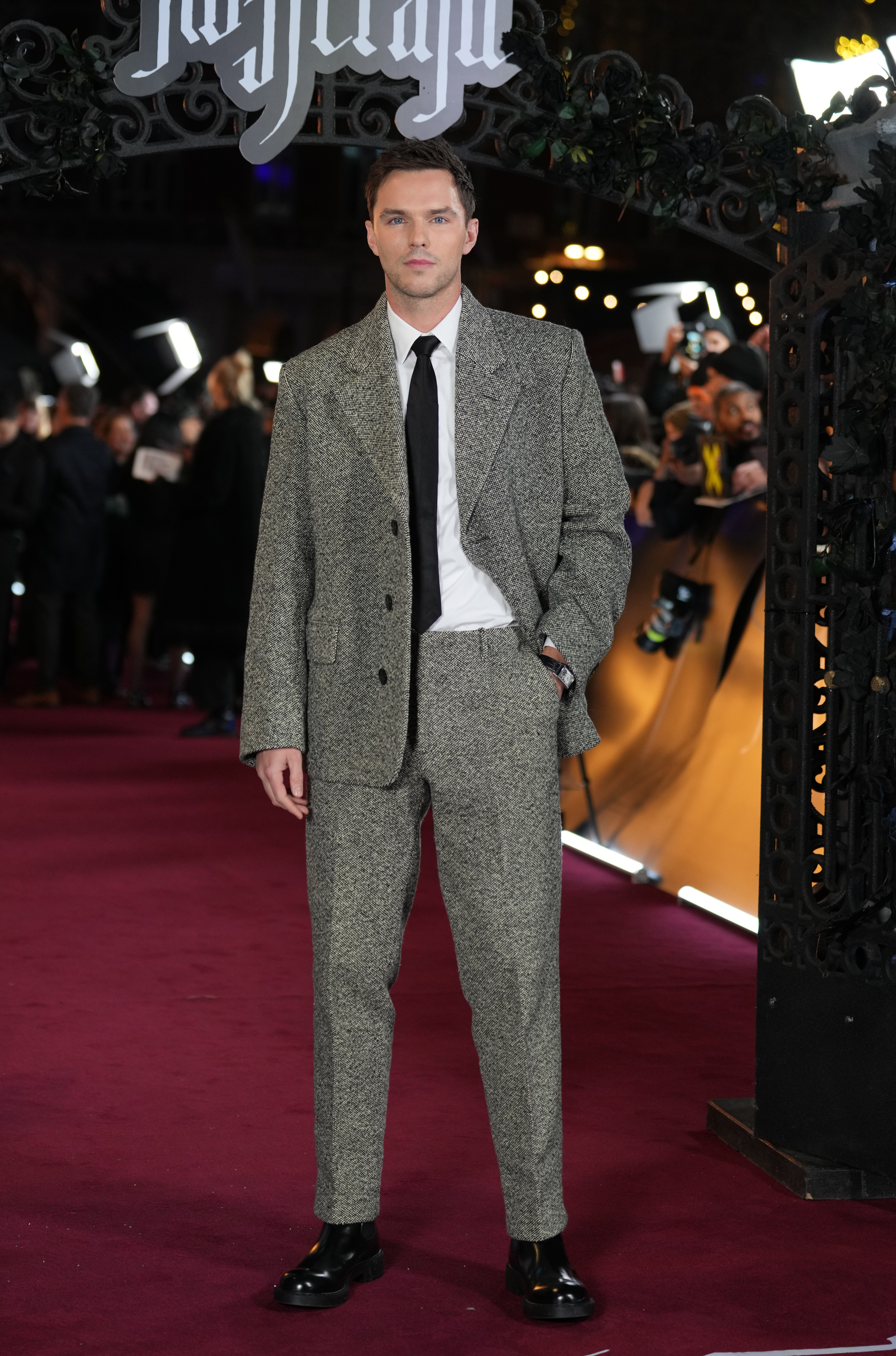 Nicholas Hoult arriving for the UK premiere of Nosferatu in Prada wool suit