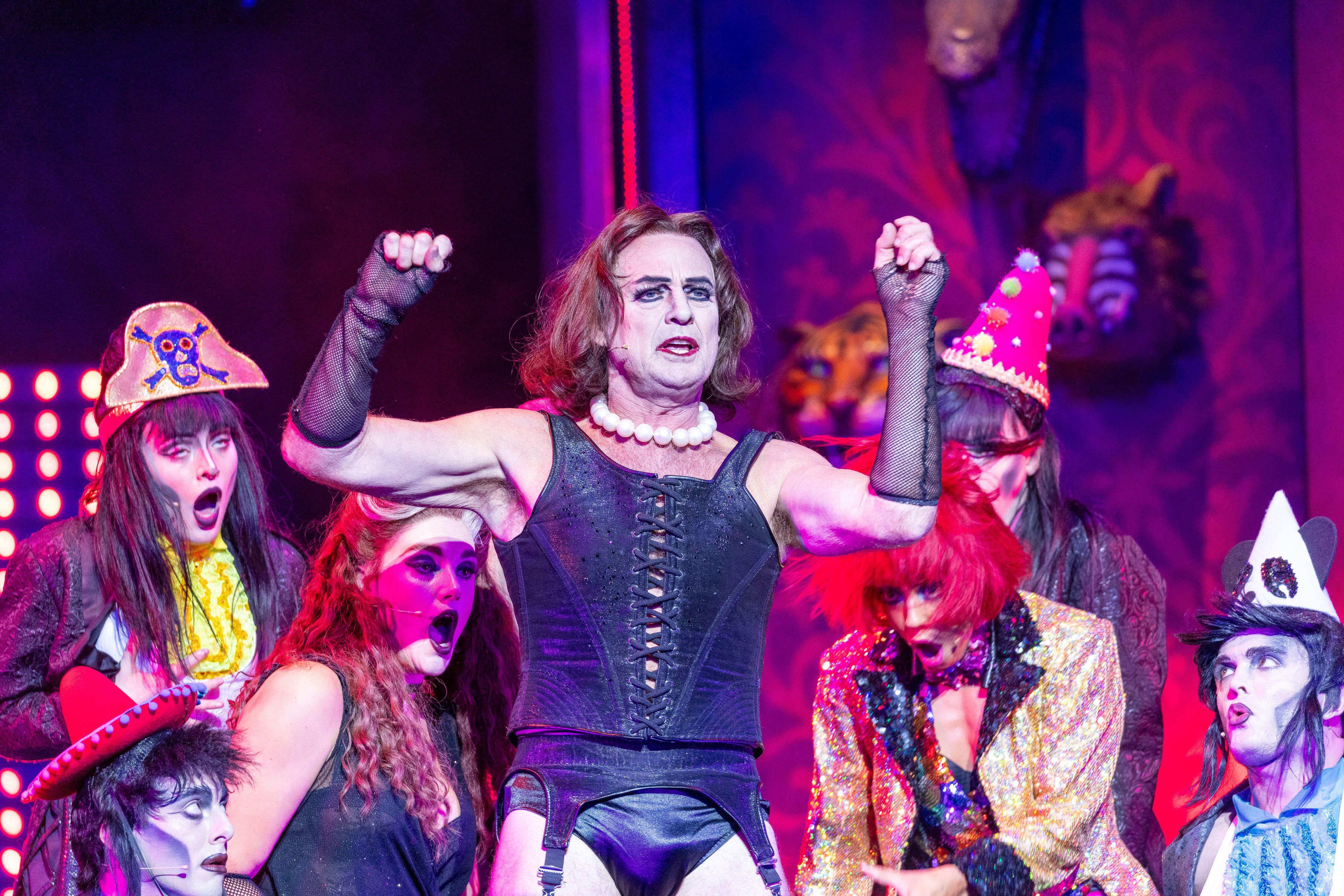 Jason Donovan (centre as Frank n Furter) and cast attending a photo call for the Rocky Horror Show musical at the The Dominion Theatre in central London