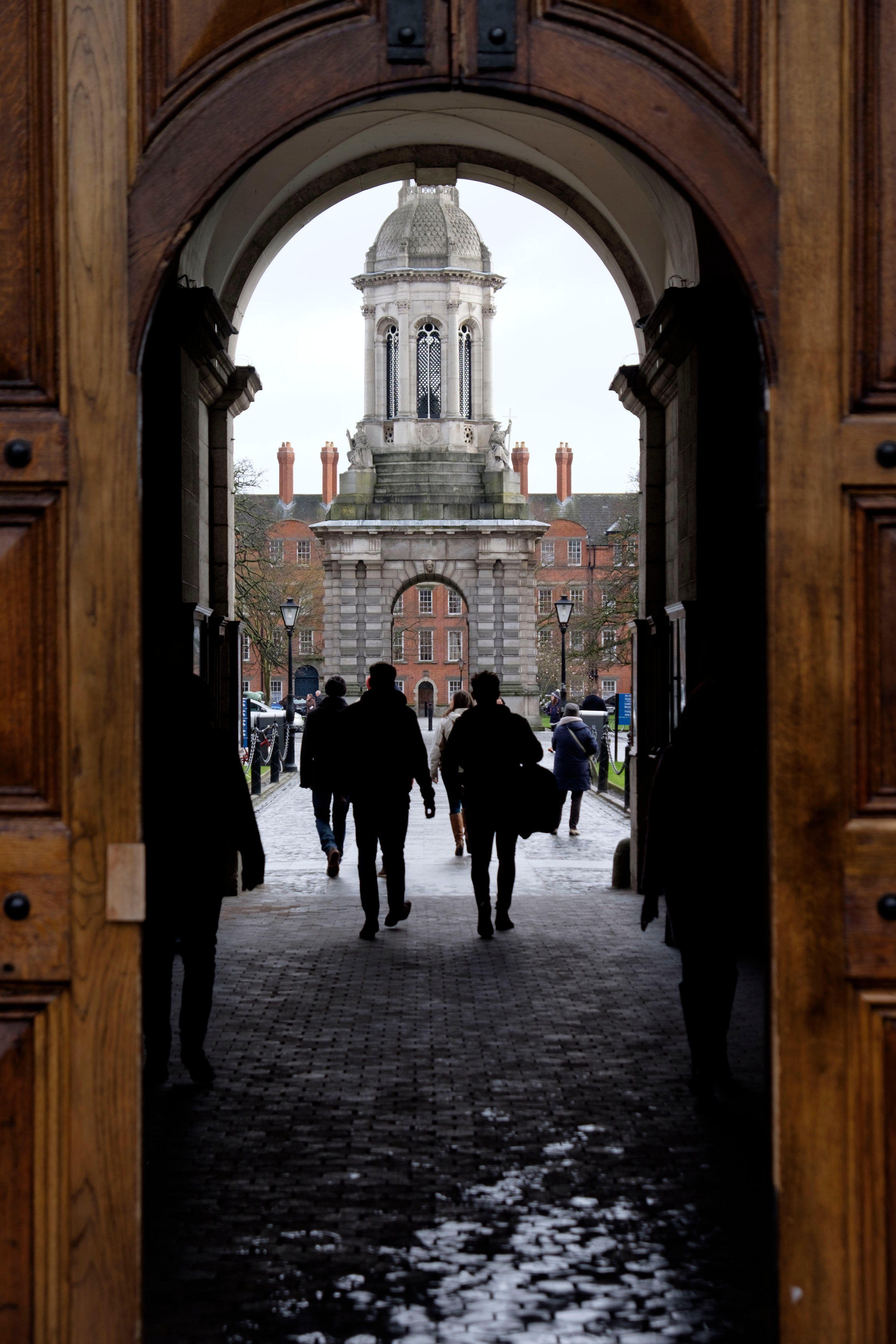 Students walk at Trinity College in Dublin