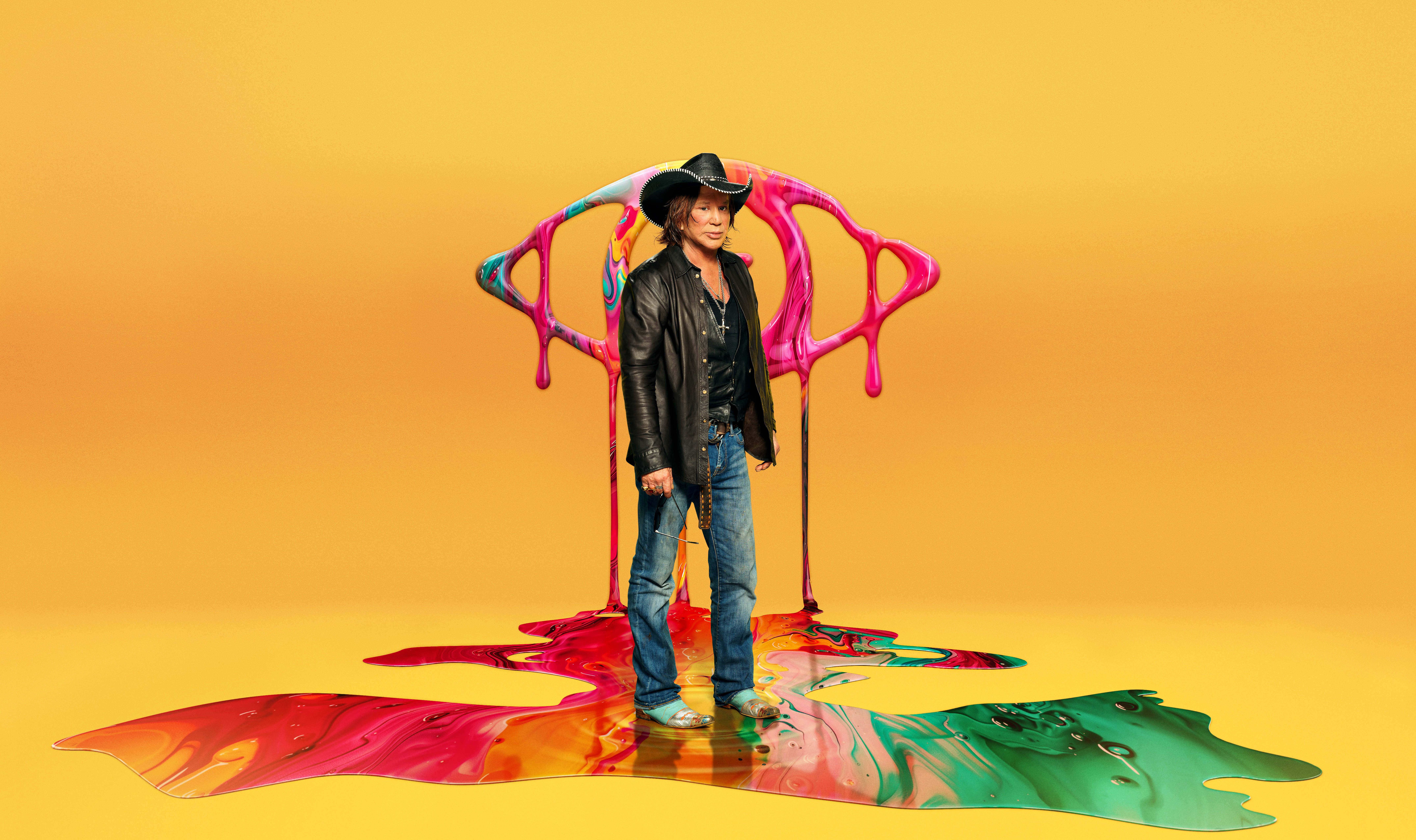 Mickey Rourke in front of Big Brother logo