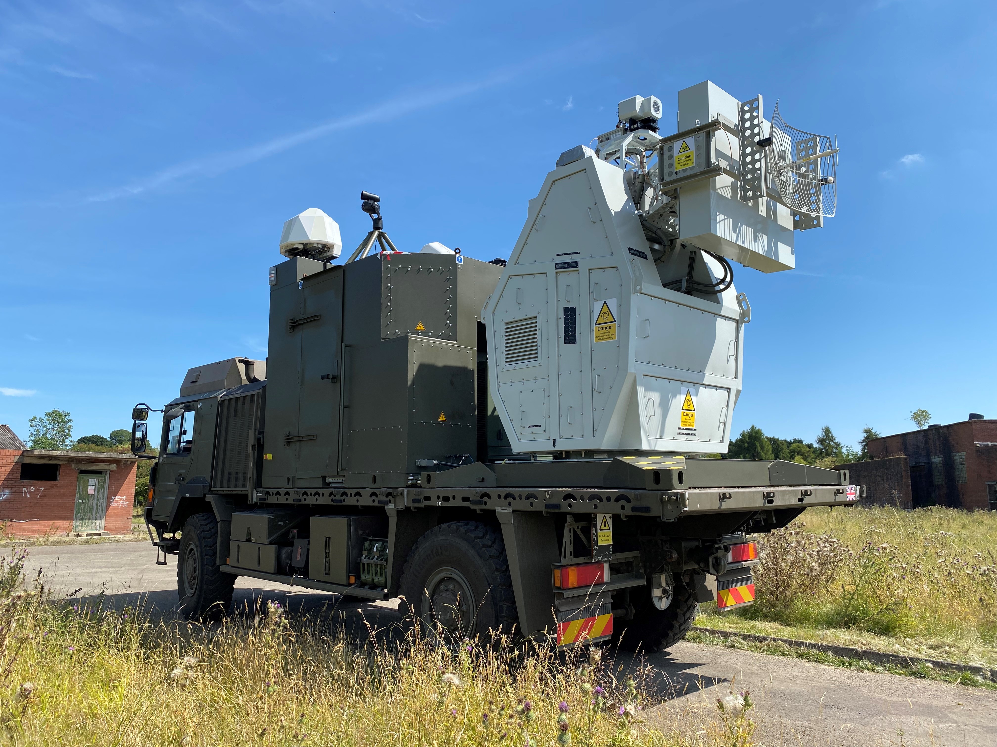 Military truck with a weapons system on the back