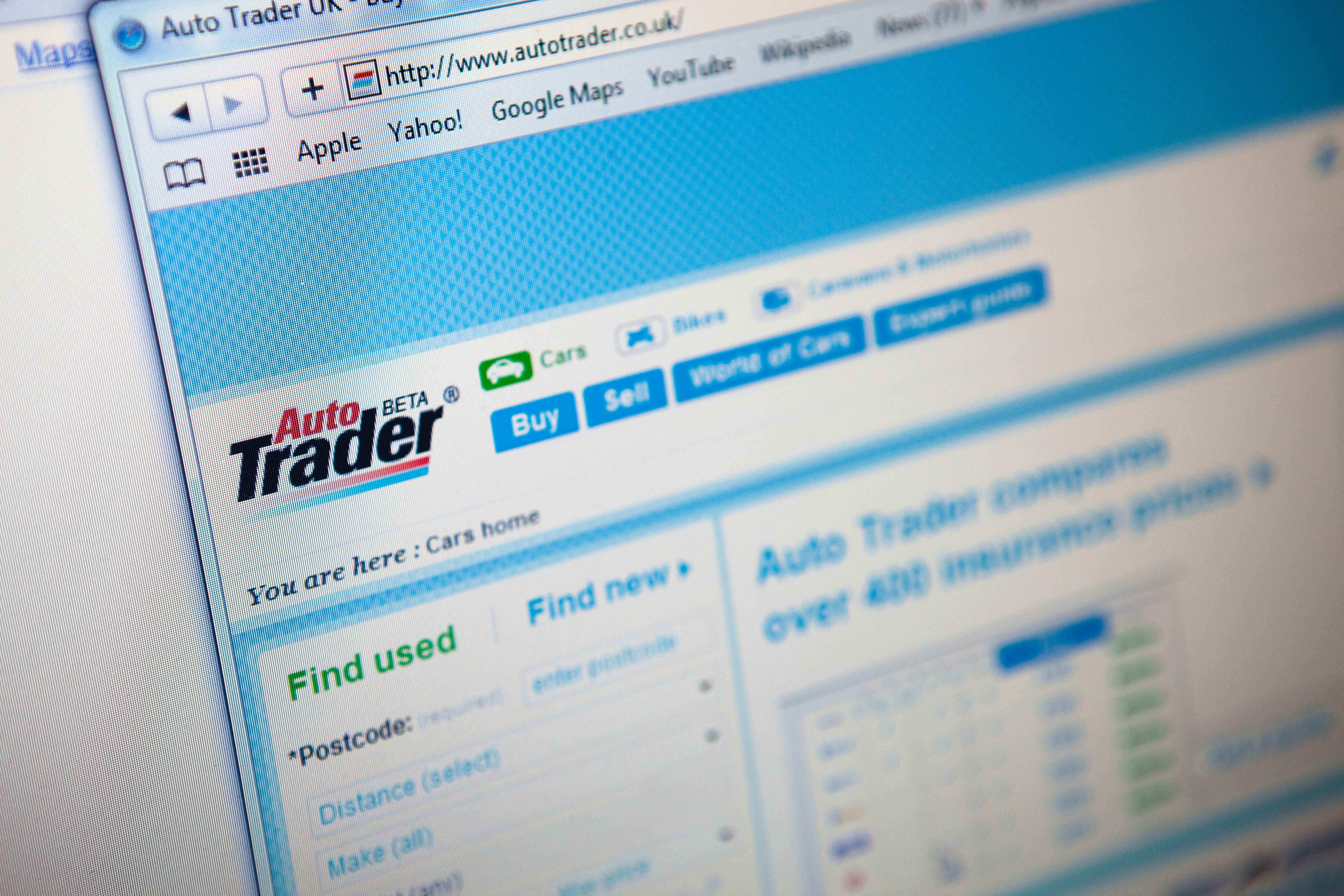 Close up of a computer monitor / screen showing the Autotrader buying cars website