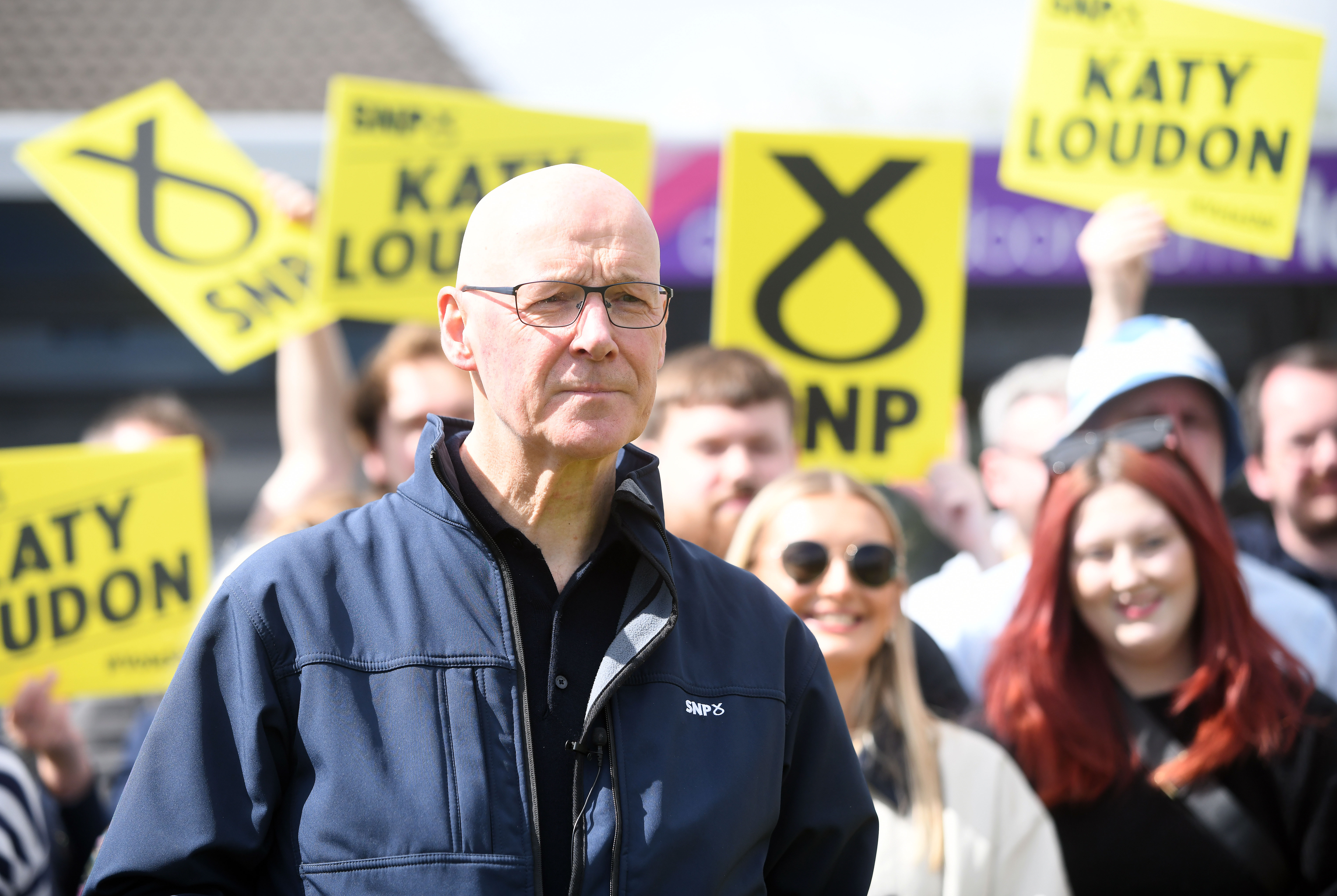 John Swinney speaks with SNP campaigners