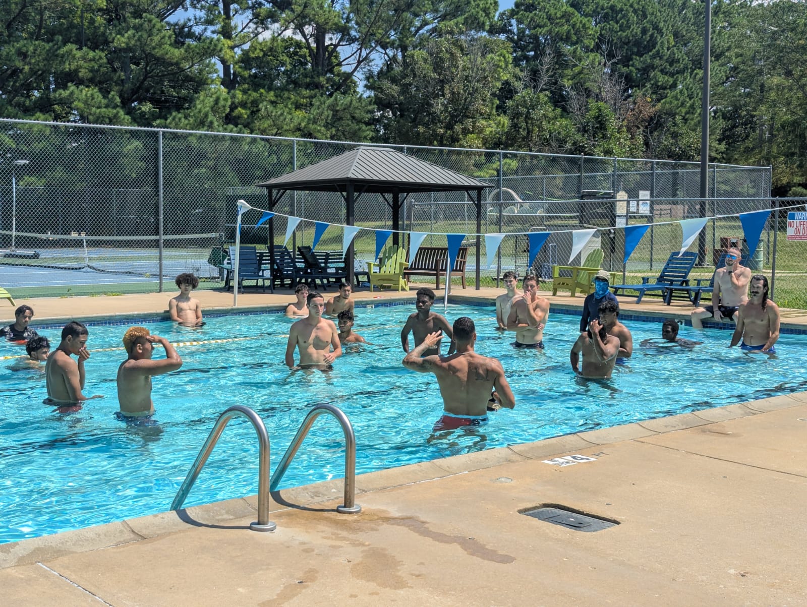 Marshall Islands players in a swimming pool