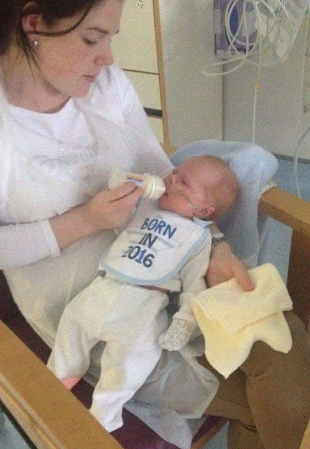Baby Andy in hospital with his mum