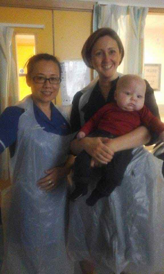 Andy as a baby with some of the team at Great Ormond Street Hospital