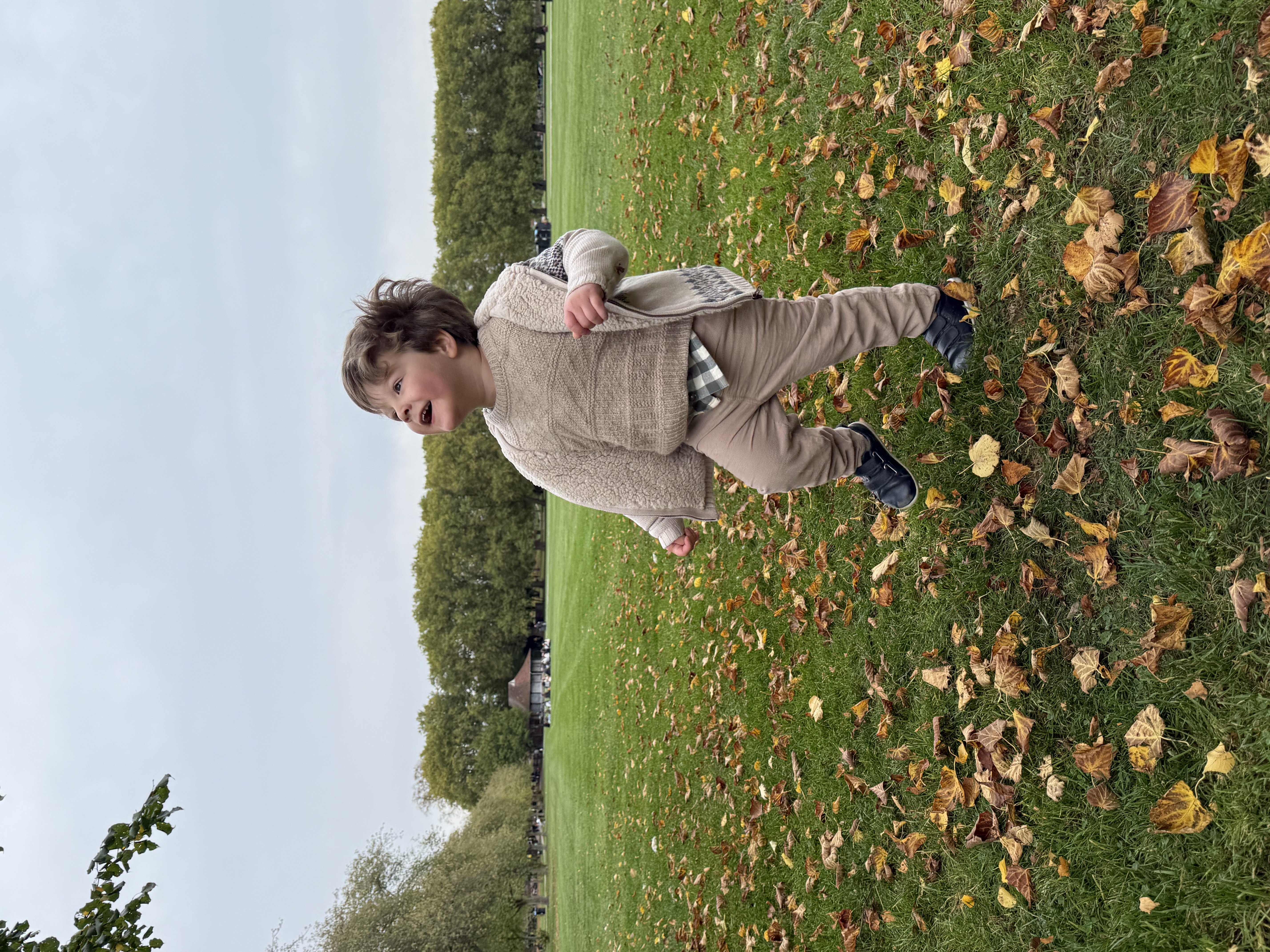 Three-year-old Nathaniel Clayton running in a park