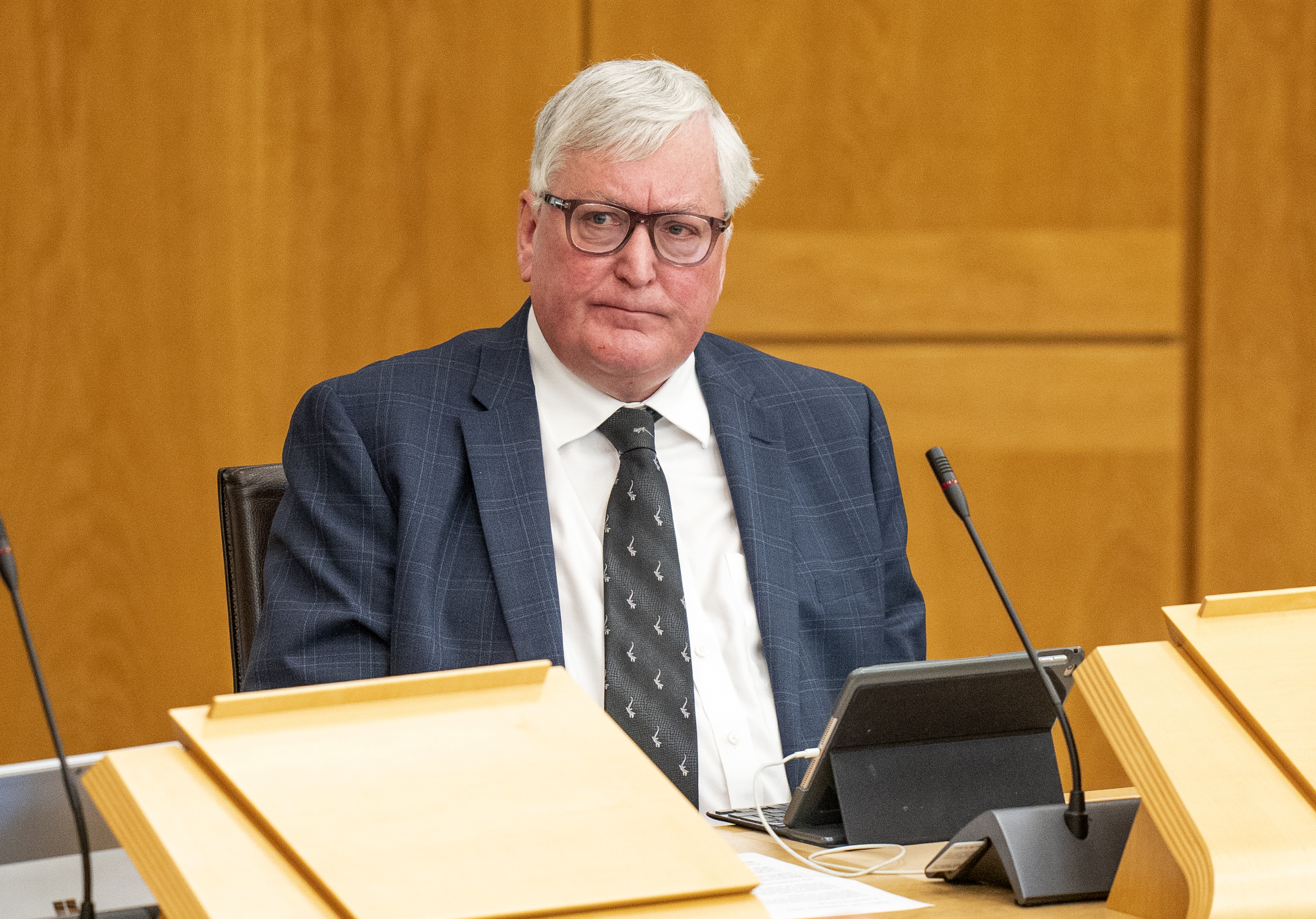 Independent MSP Fergus Ewing listens during a Scottish Parliament debate